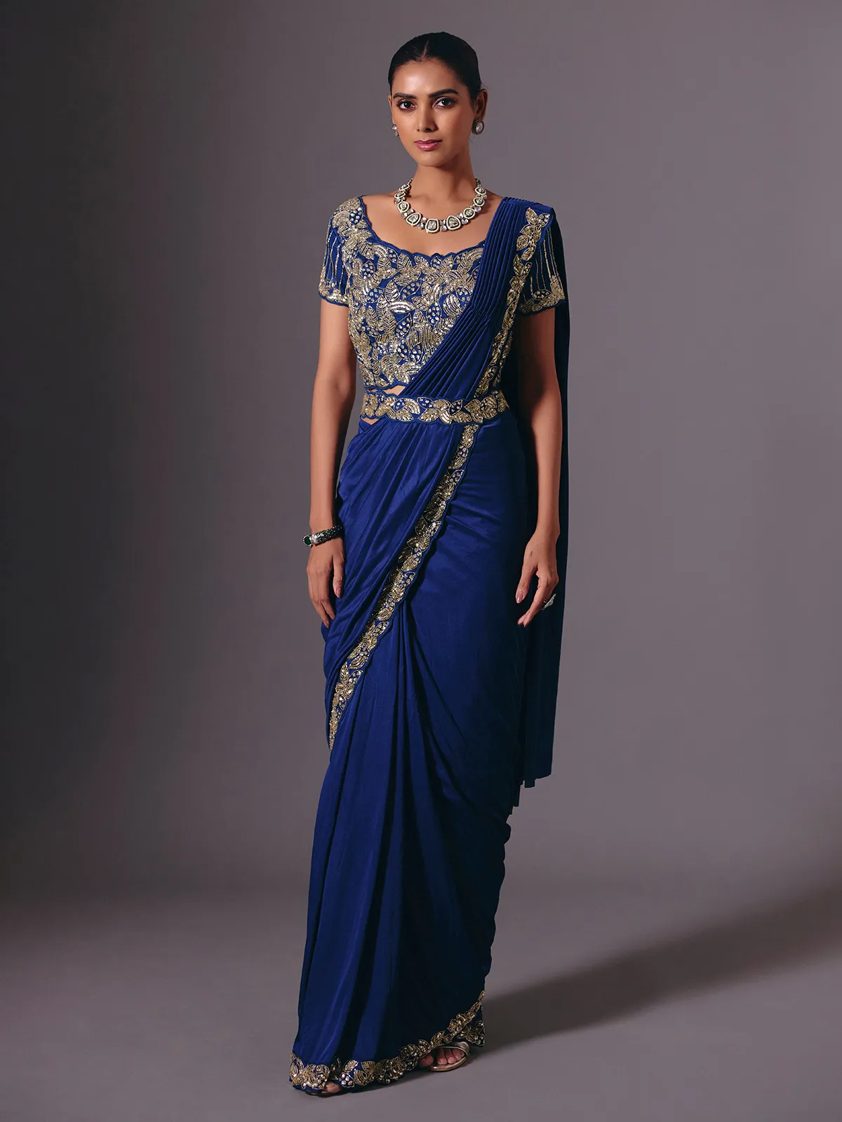 Blue satin lycra saree with sparkling festive embellishments