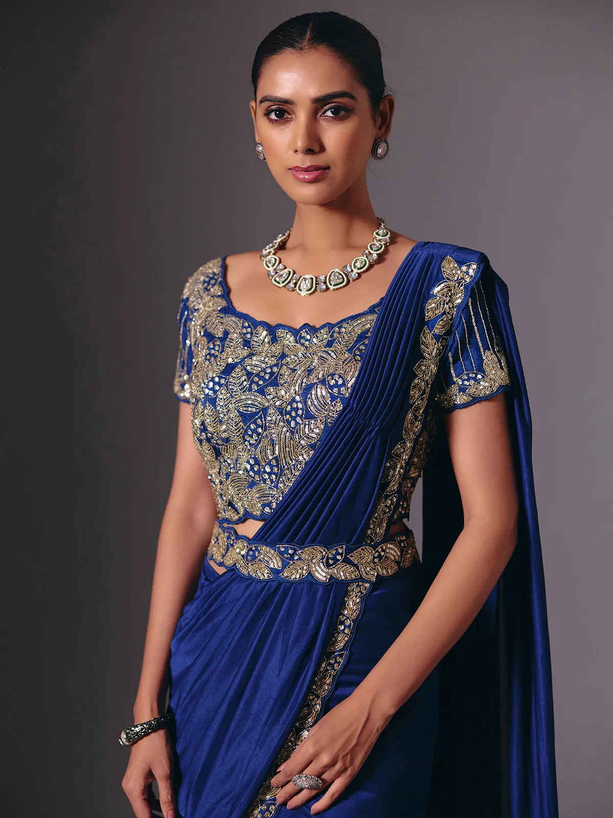 Blue satin lycra saree with sparkling festive embellishments