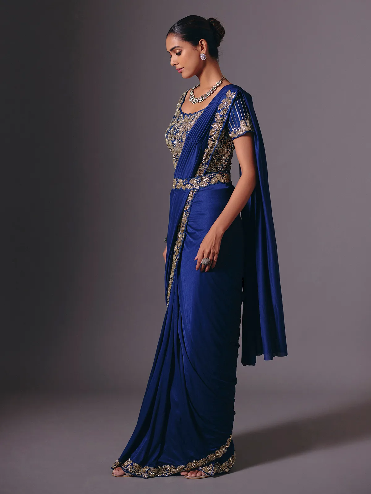 Blue satin lycra saree with sparkling festive embellishments