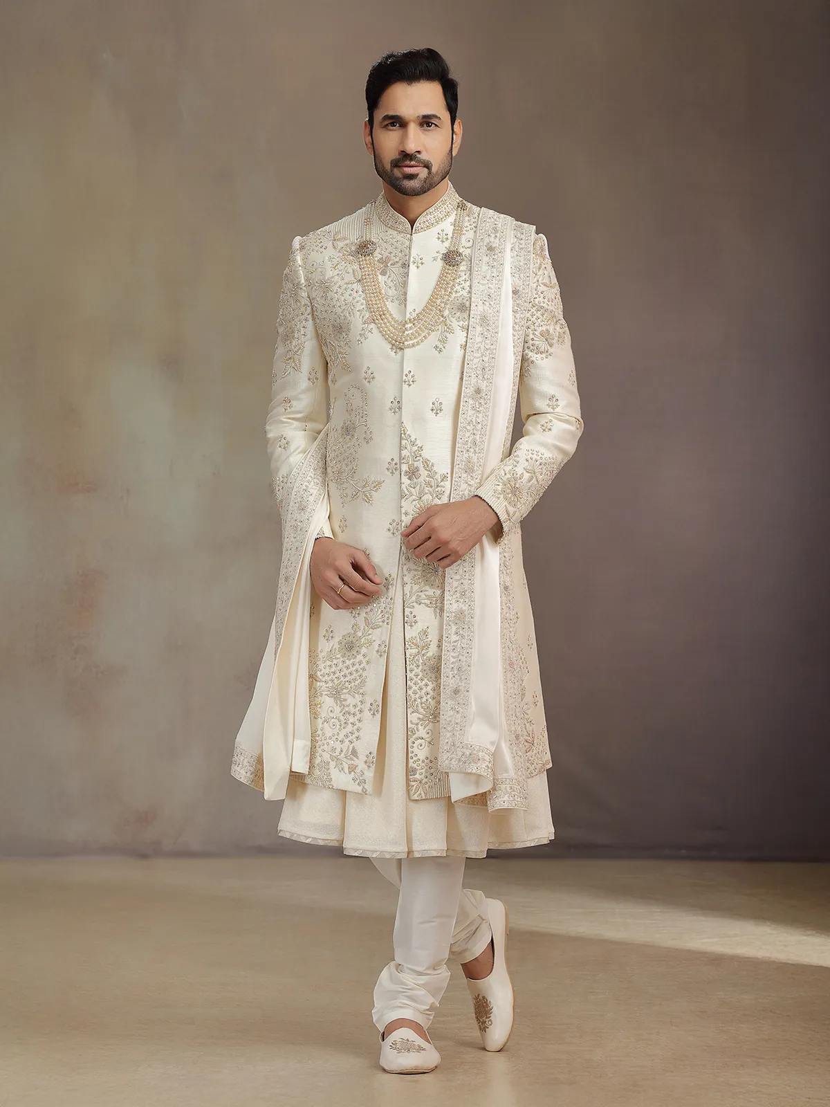 Light gold silk sherwani for groom with dupatta