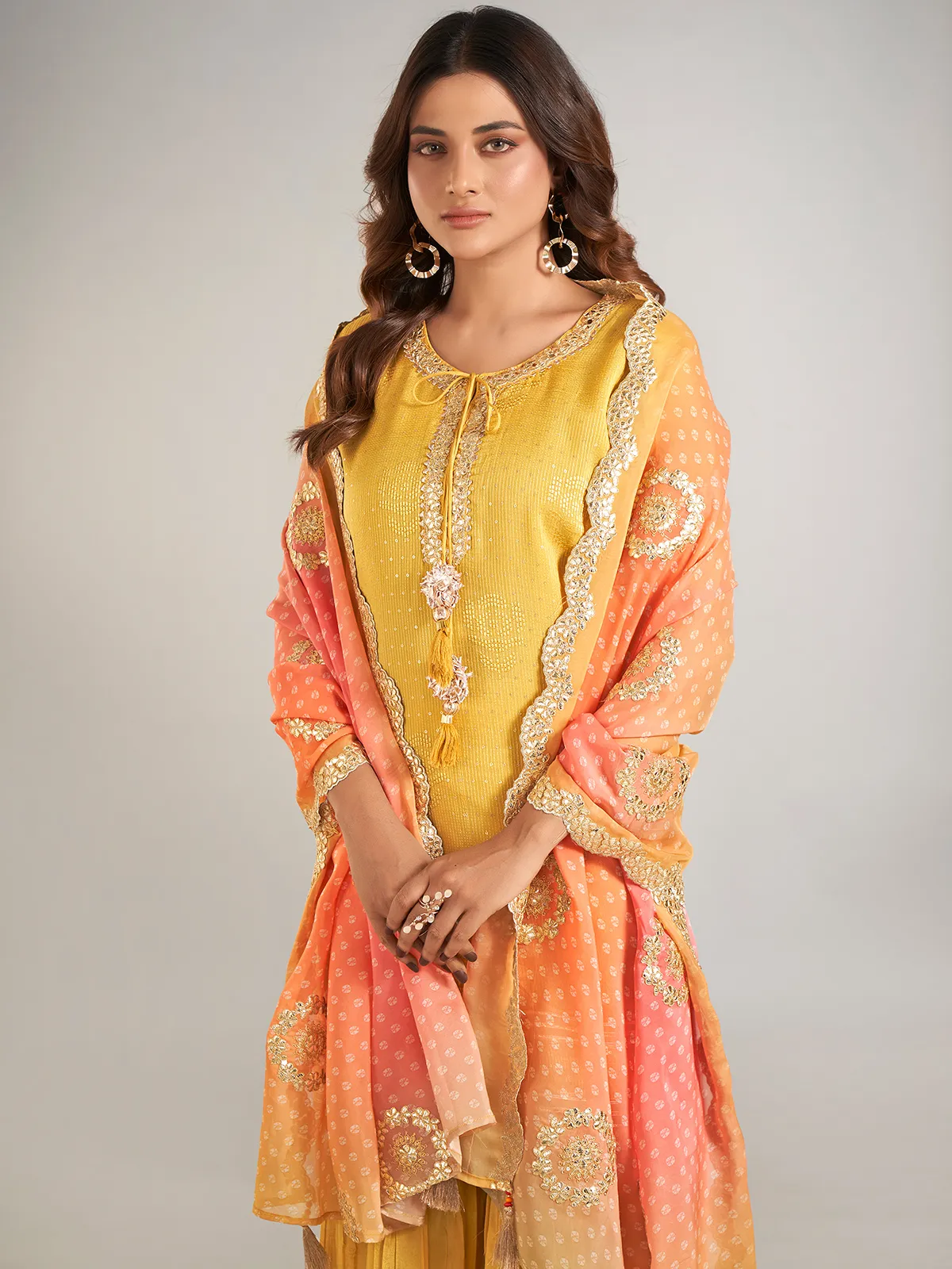 Mustard yellow silk sharara suit with dupatta