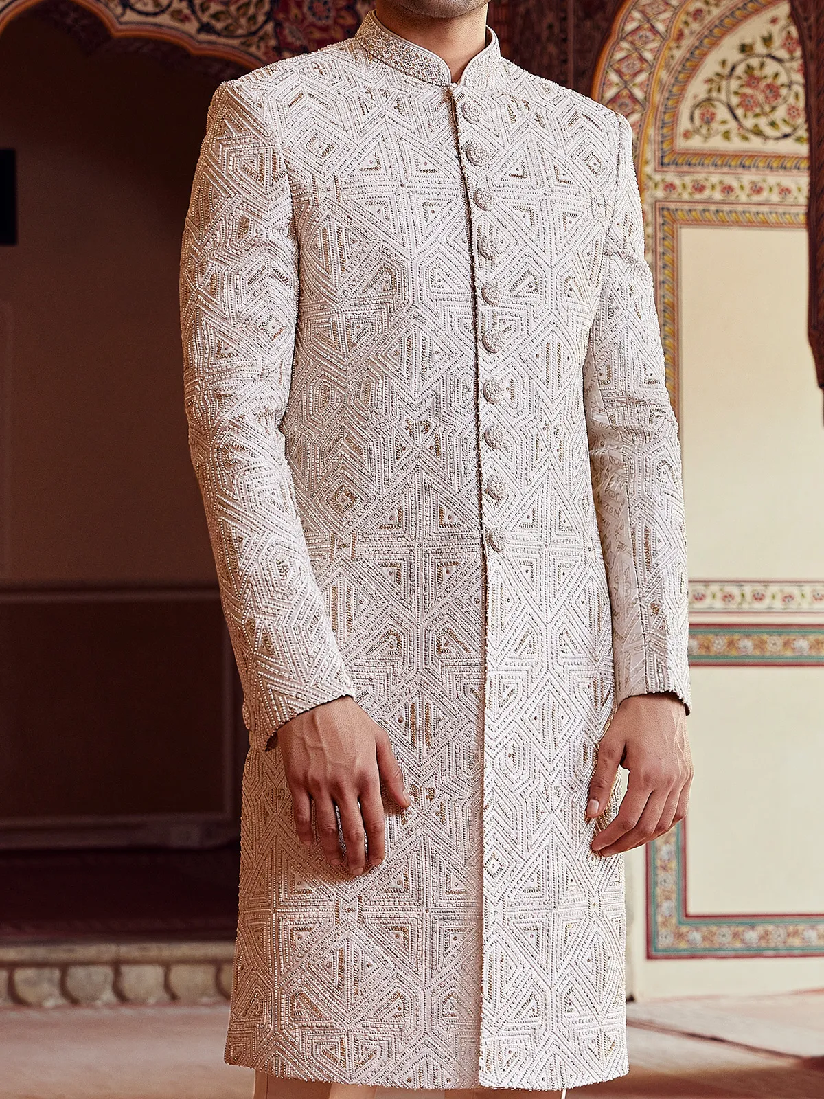 Peshwai style cream peach sherwani for groom