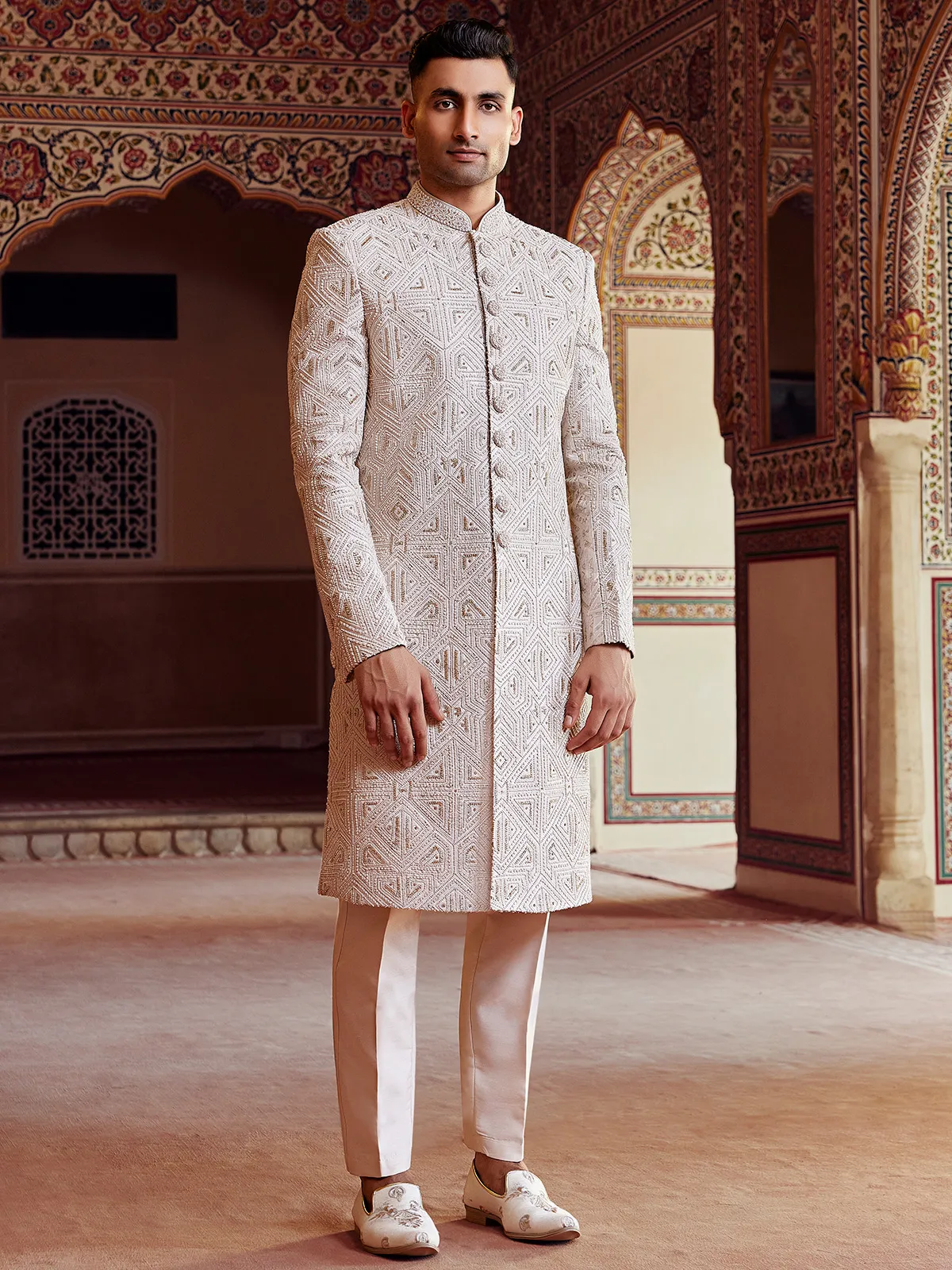 Peshwai style cream peach sherwani for groom
