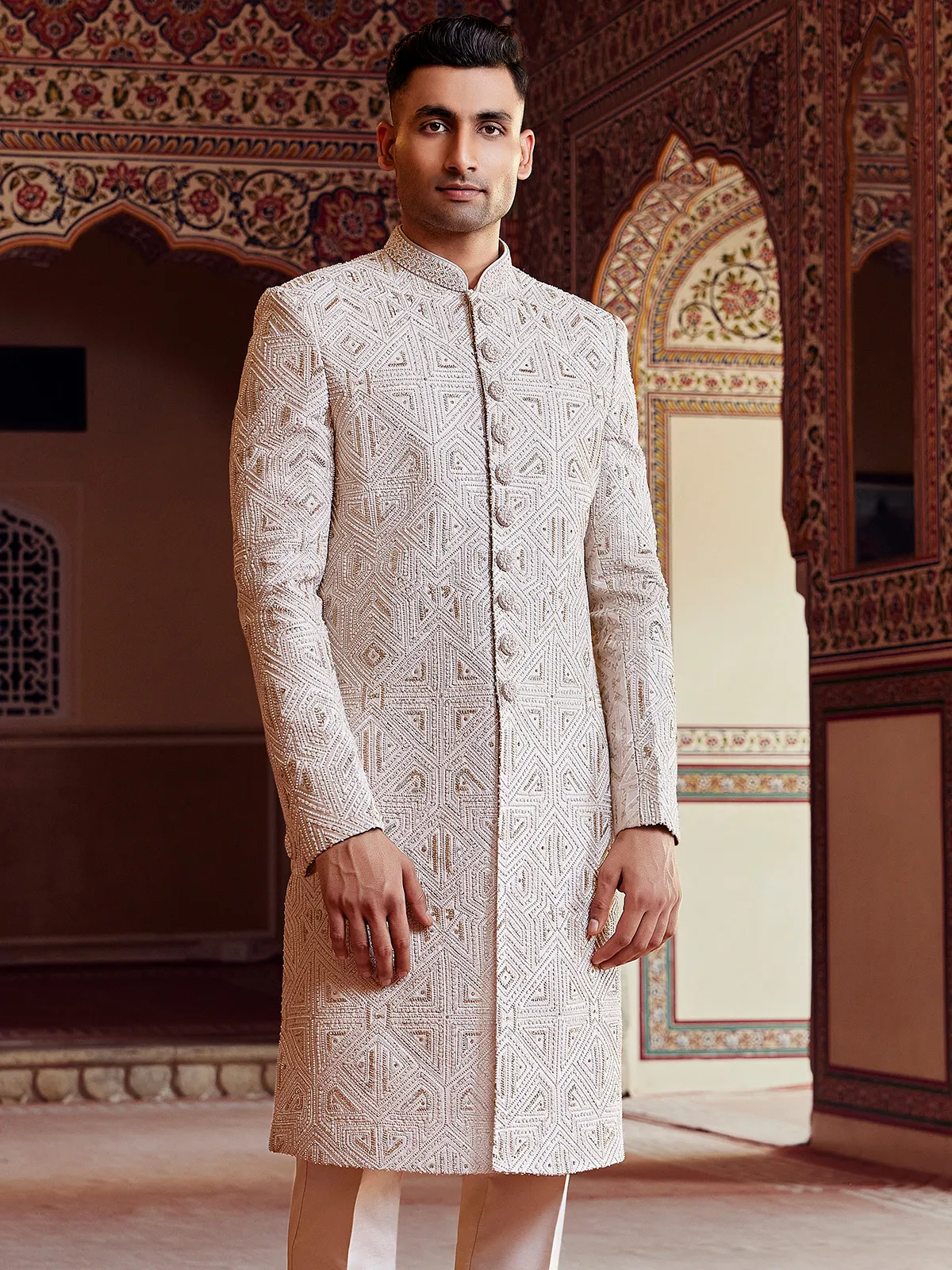 Peshwai style cream peach sherwani for groom