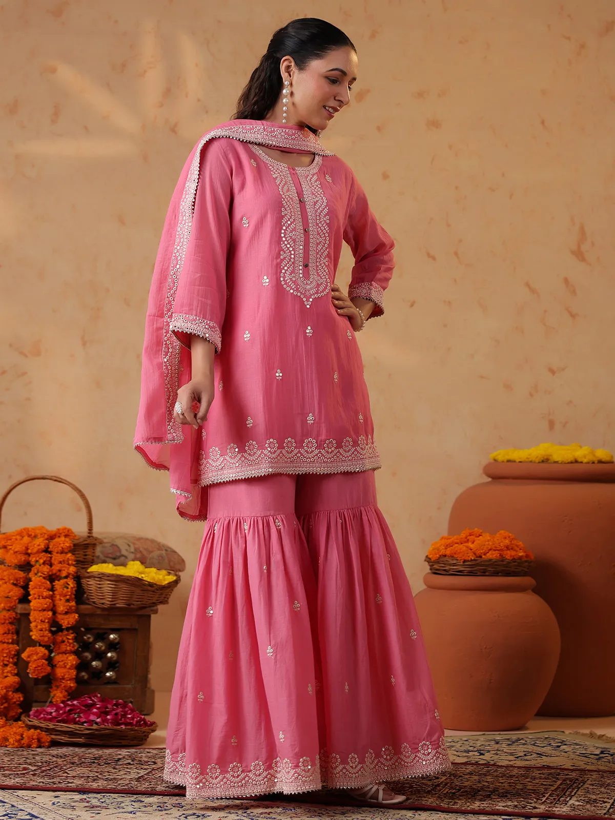 Pink silk festive sharara set with embroidery embellishments
