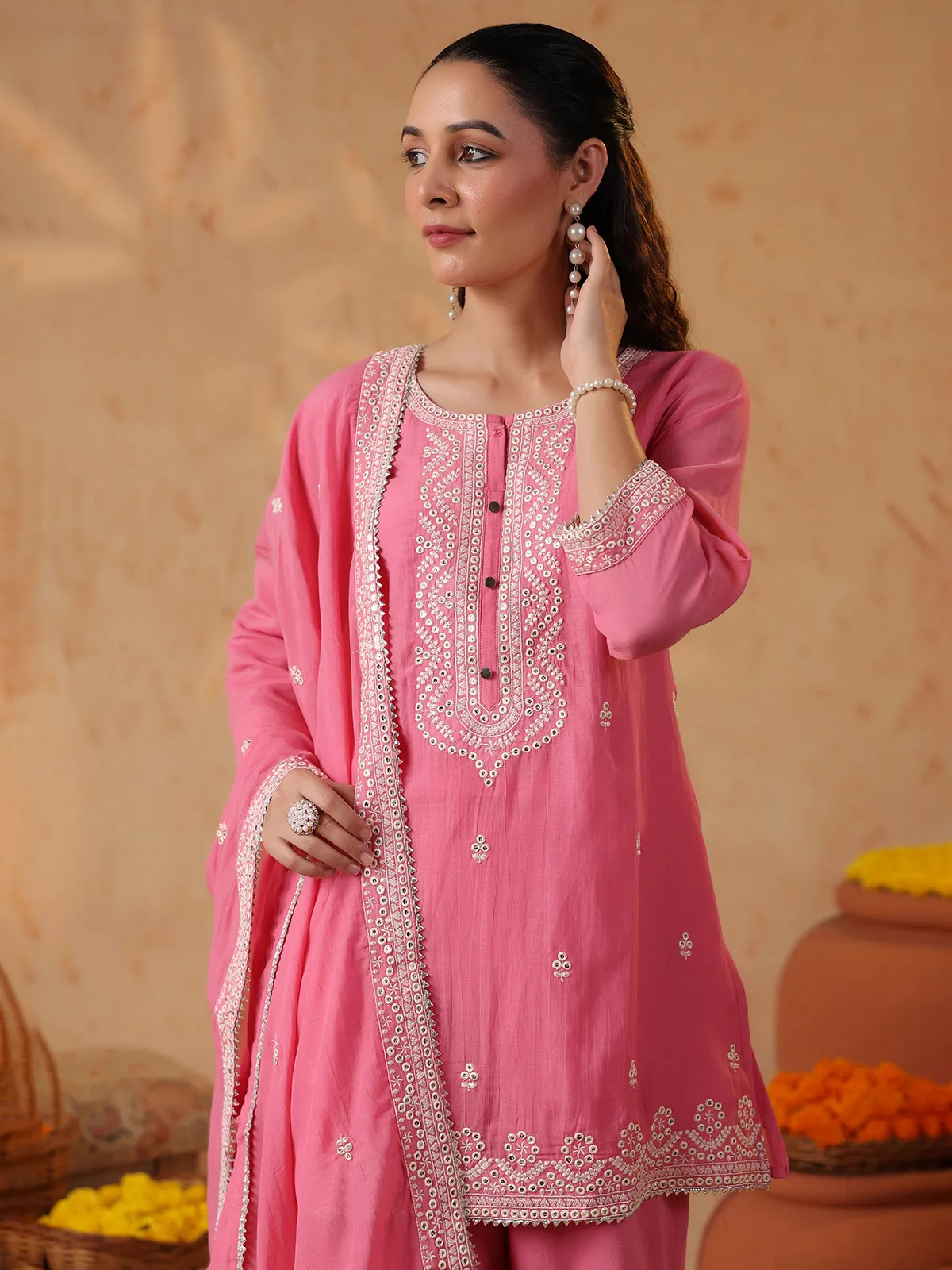 Pink silk festive sharara set with embroidery embellishments