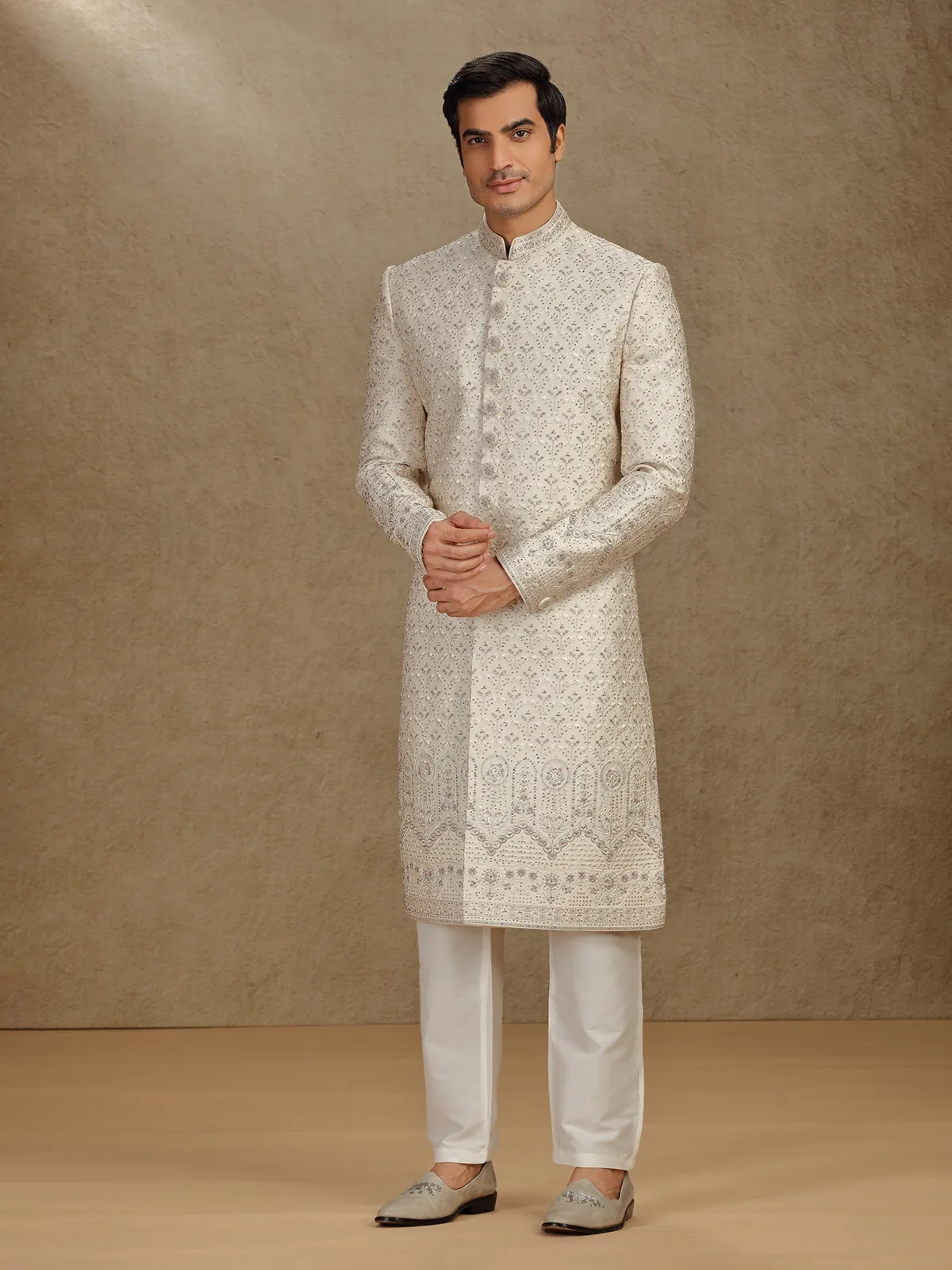 Royal cream silk sherwani for wedding celebrations