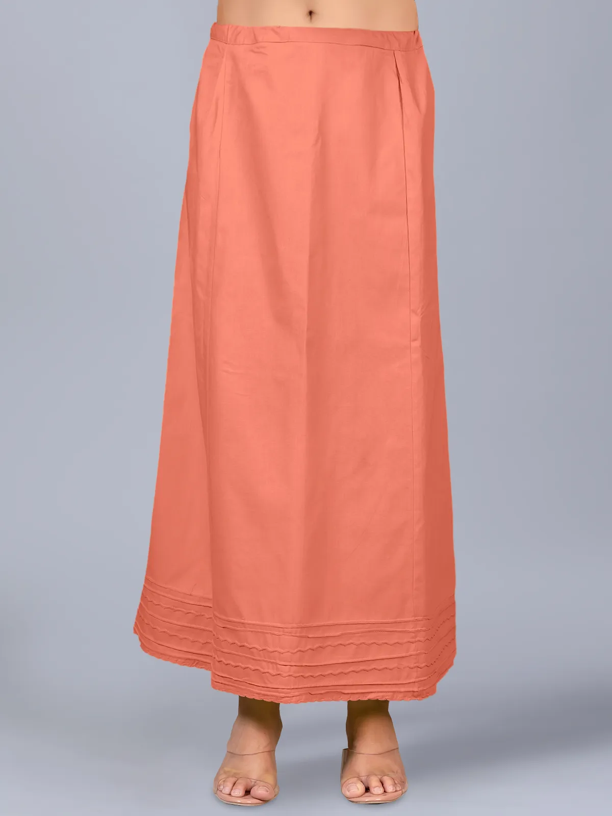 Dark peach plain saree petticot