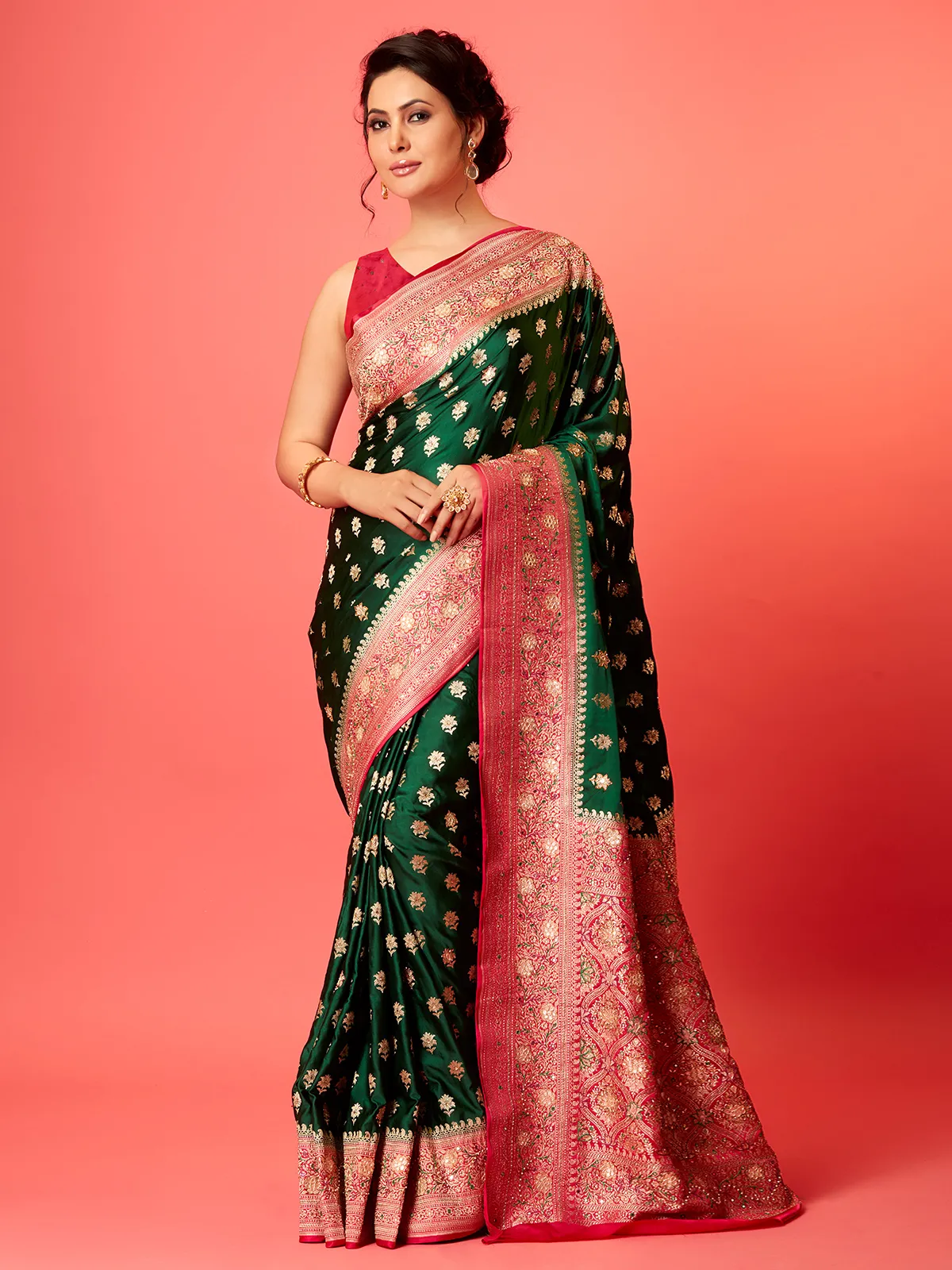 Elegant dark green silk zari saree