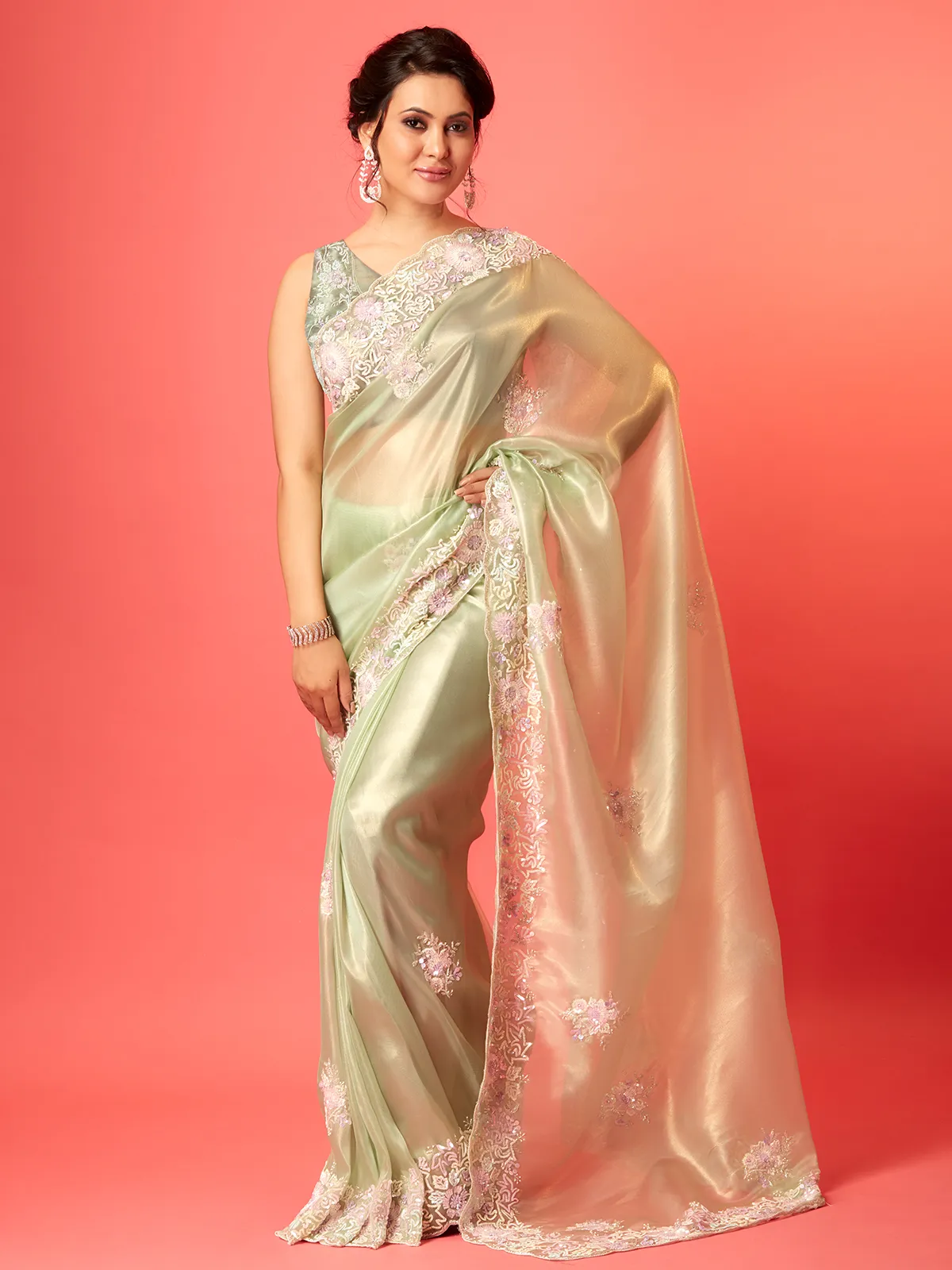 Elegant light green organza saree