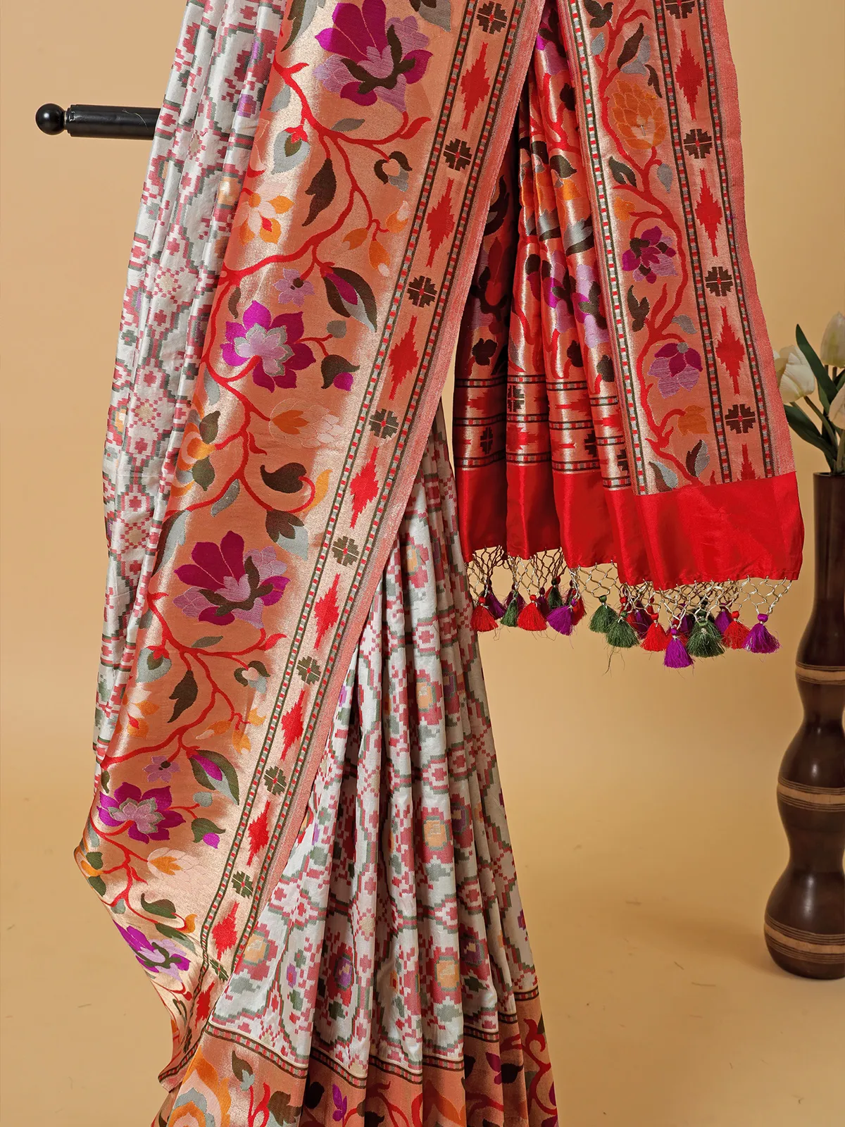 White banarasi silk patola print saree