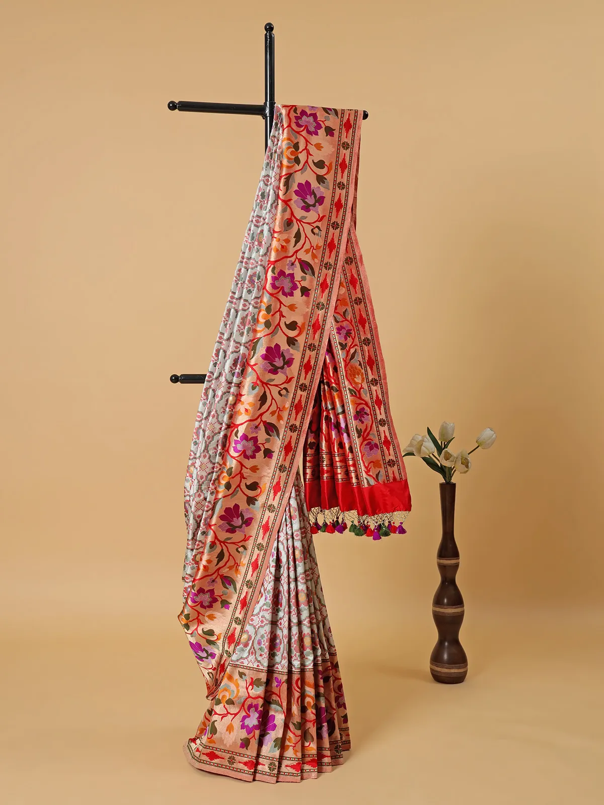 White banarasi silk patola print saree