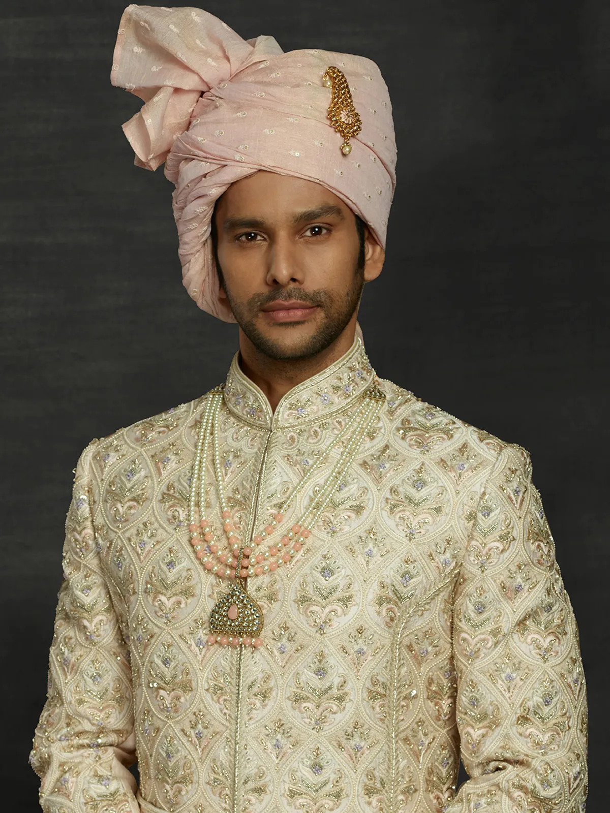 A eternal light peach wedding sherwani in silk