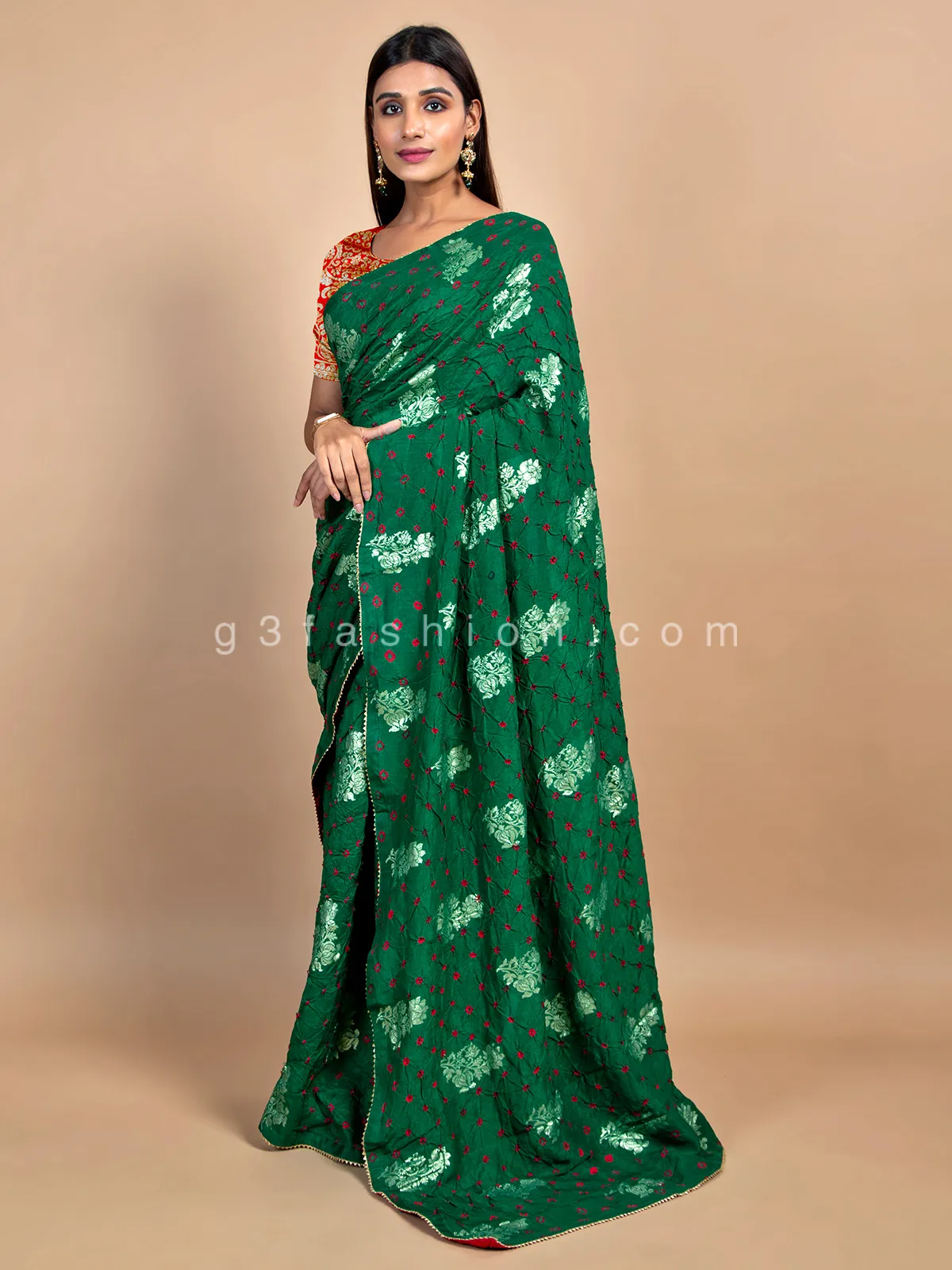 Amazing bandhej dark green saree for wedding