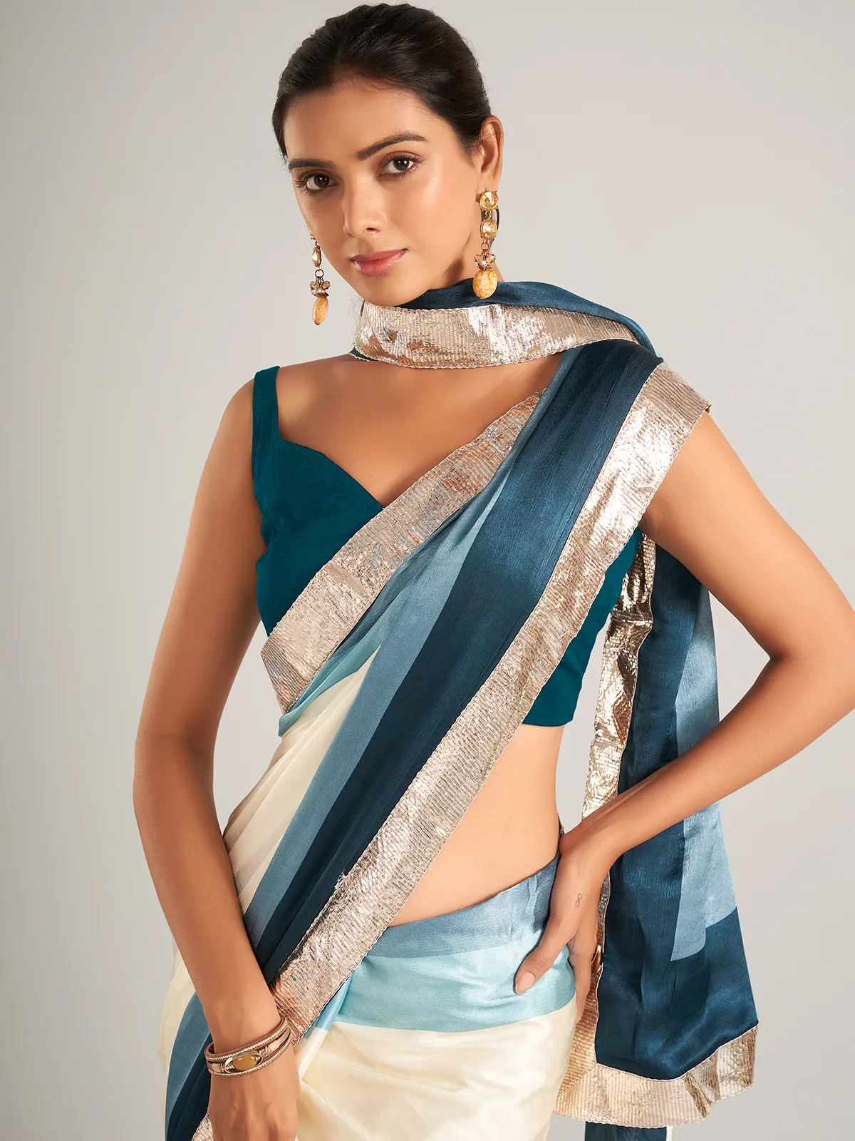 Appealing cream and blue masru silk saree