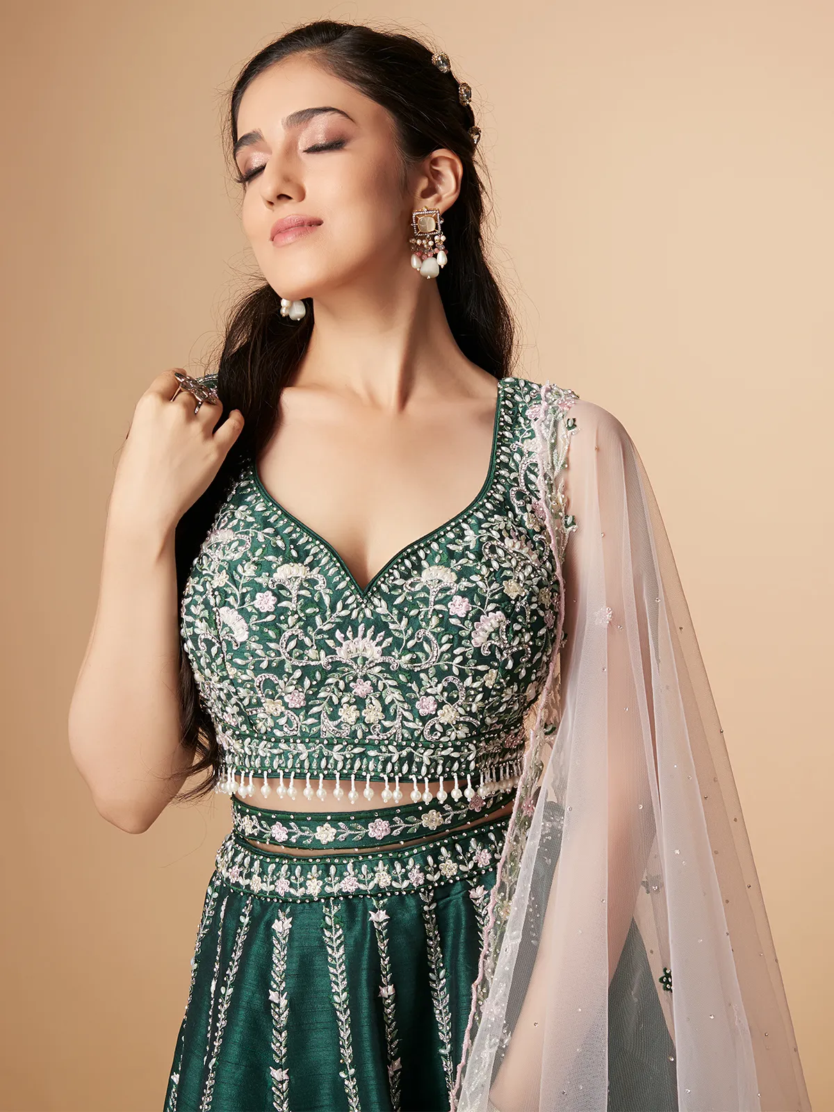 Attractive dark green raw silk lehenga choli