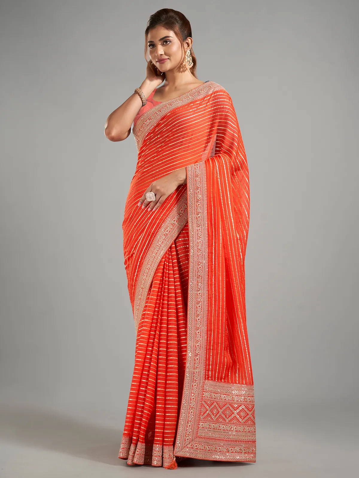 Attractive orange georgette saree