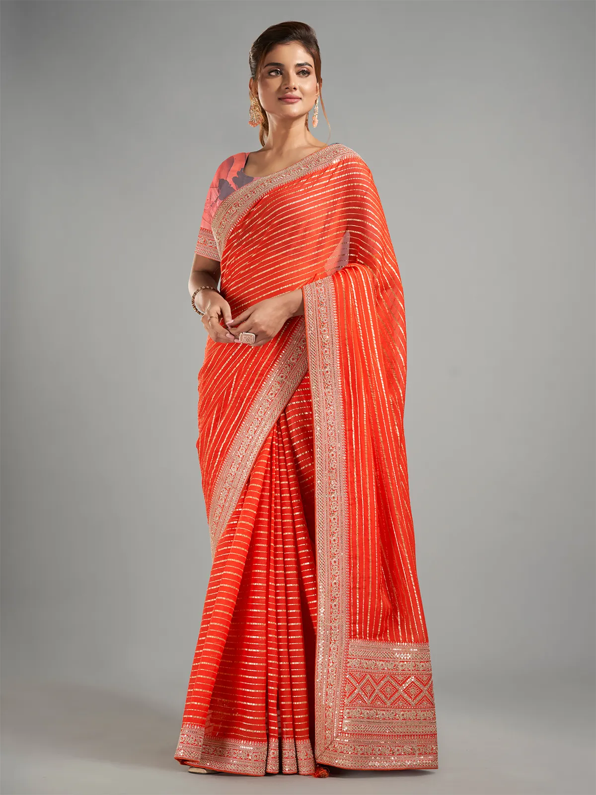 Attractive orange georgette saree