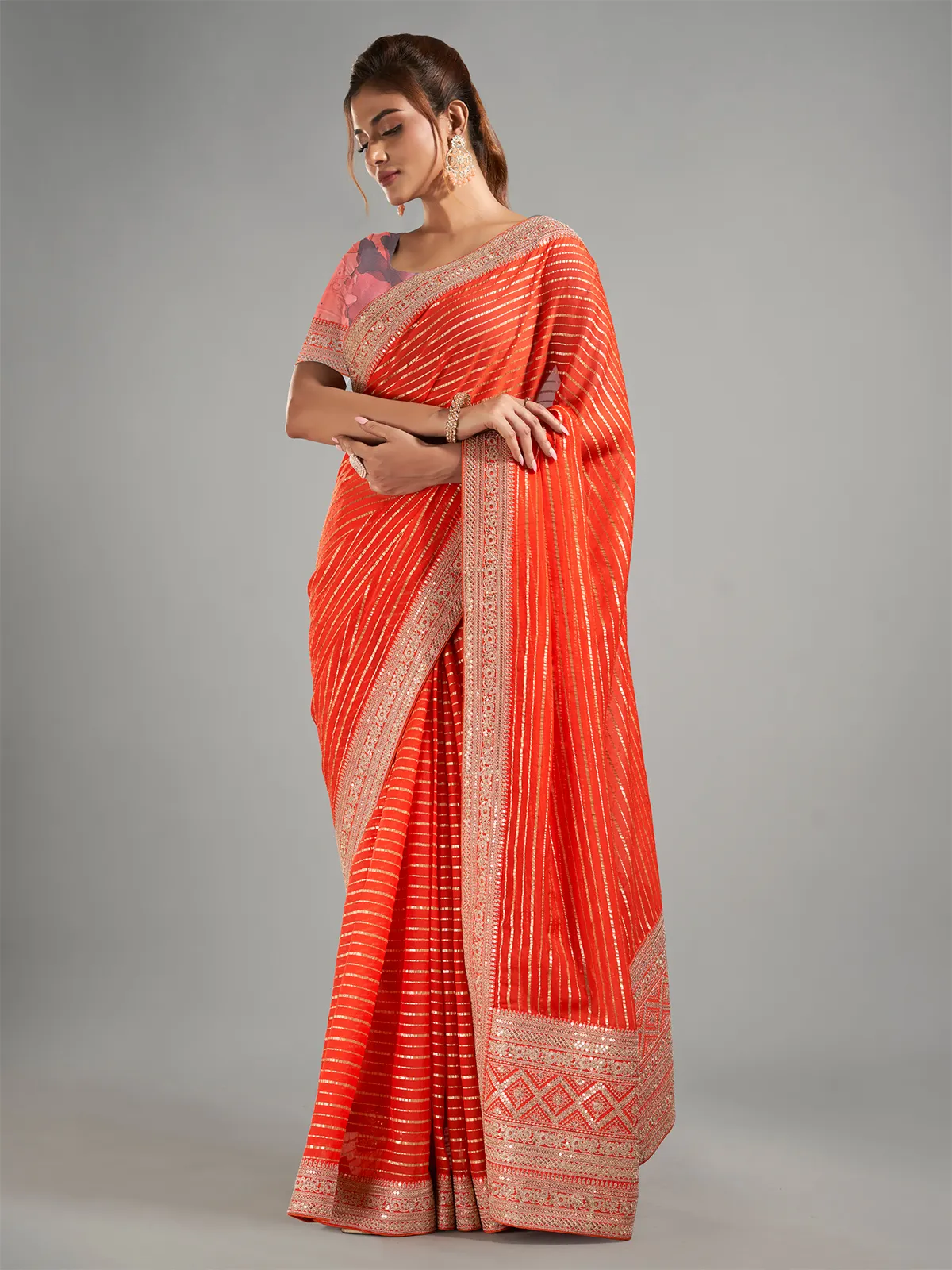 Attractive orange georgette saree