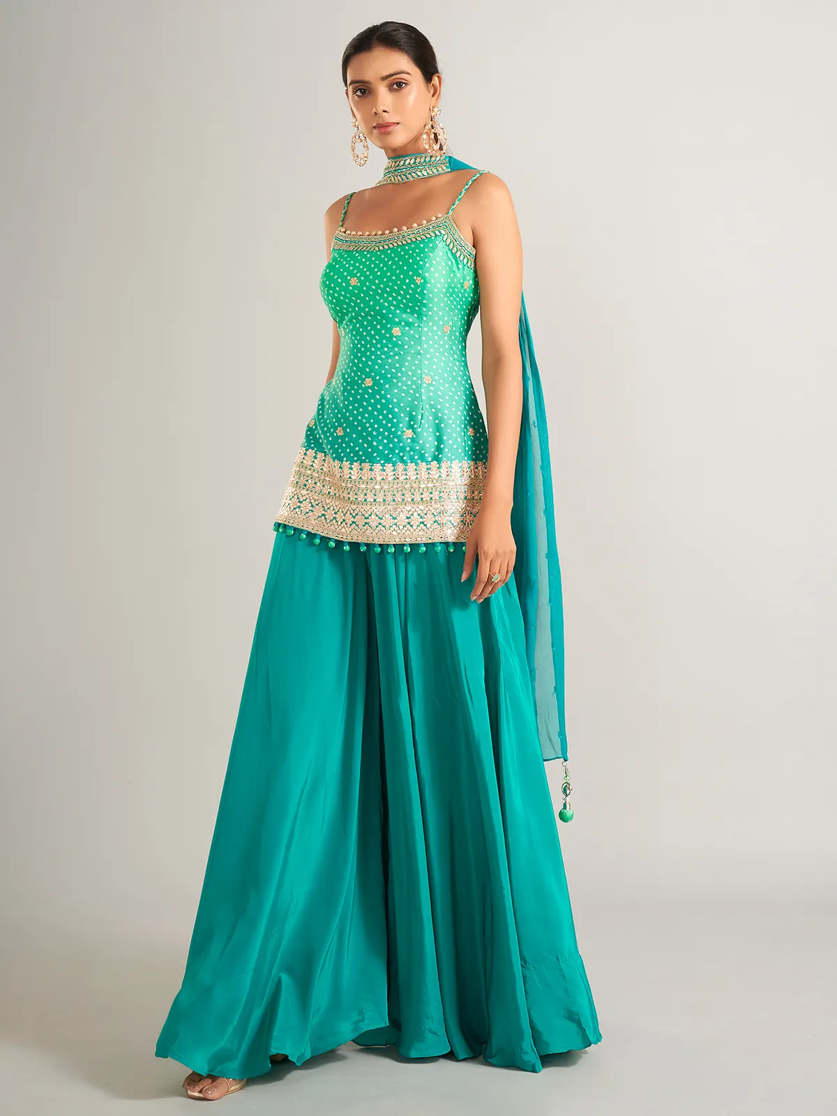 Bandhani print silk rama green palazzo salwar suit
