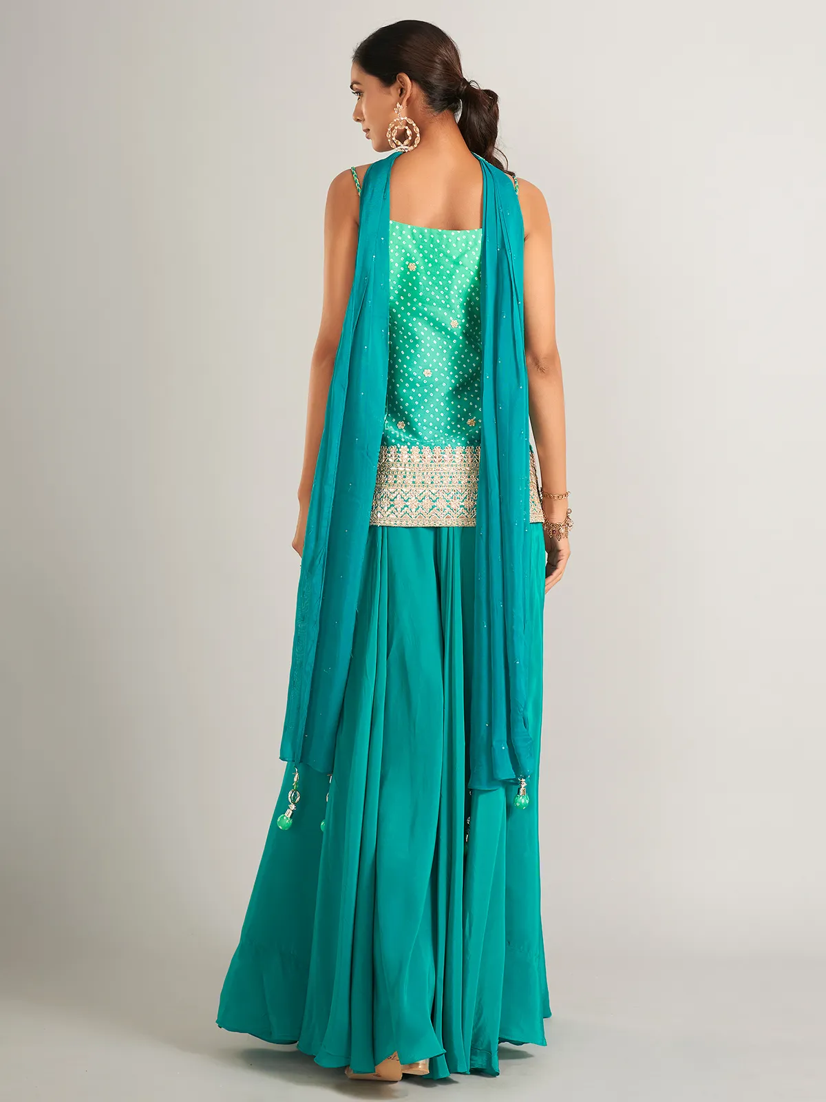 Bandhani print silk rama green palazzo salwar suit