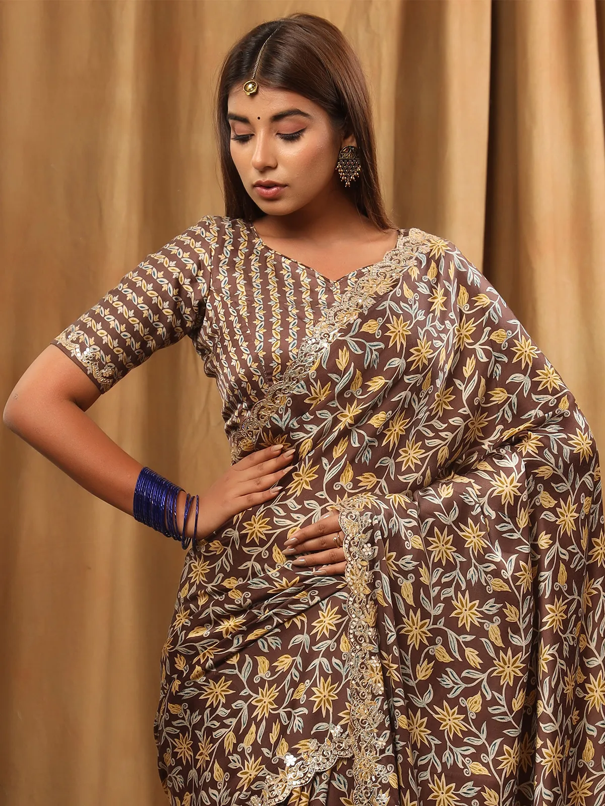 Beautiful brown printed satin saree for festive