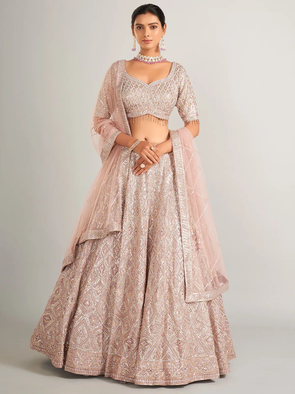 Beautiful onion hue lehenag choli in net