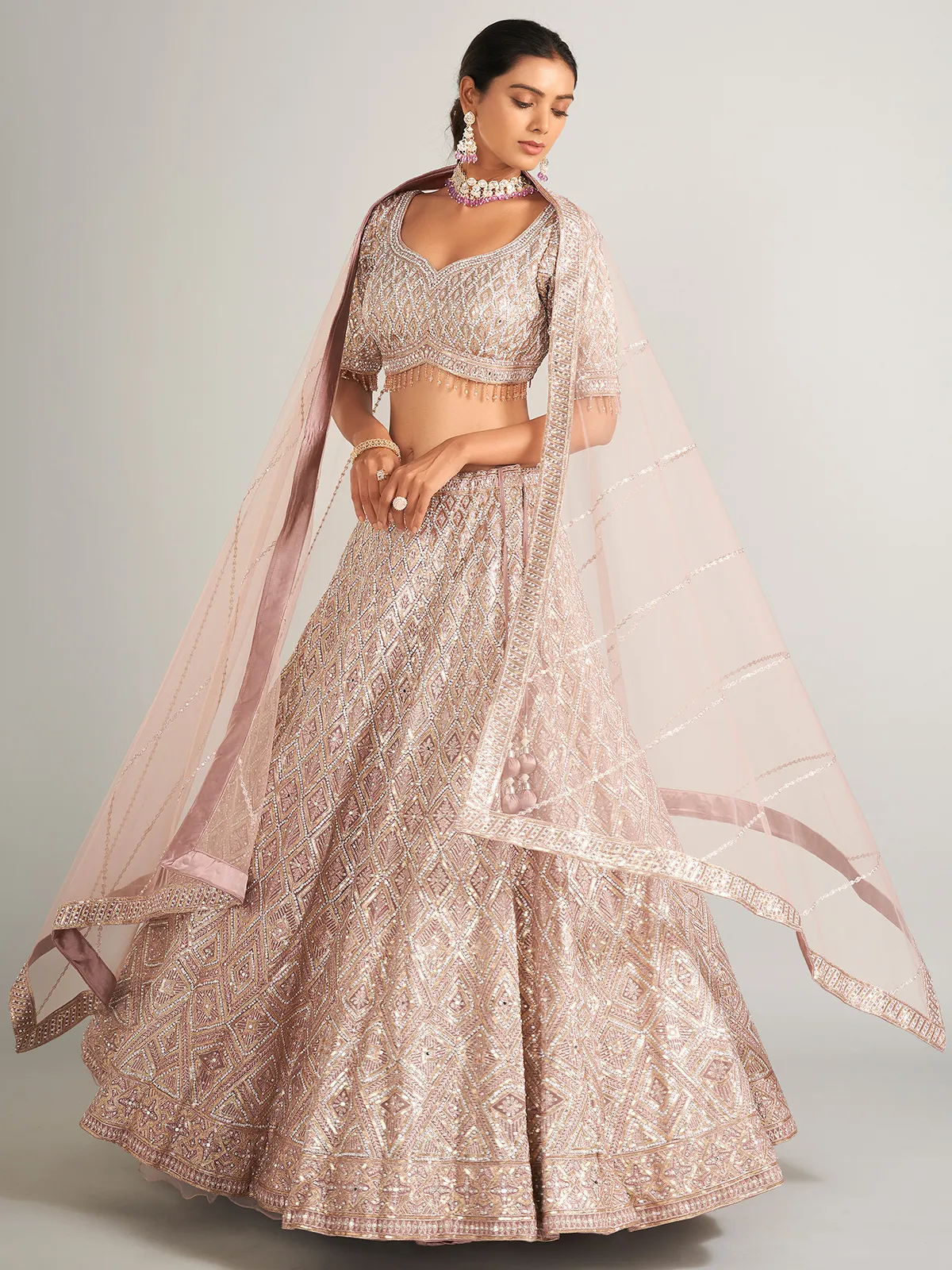 Beautiful onion hue lehenag choli in net