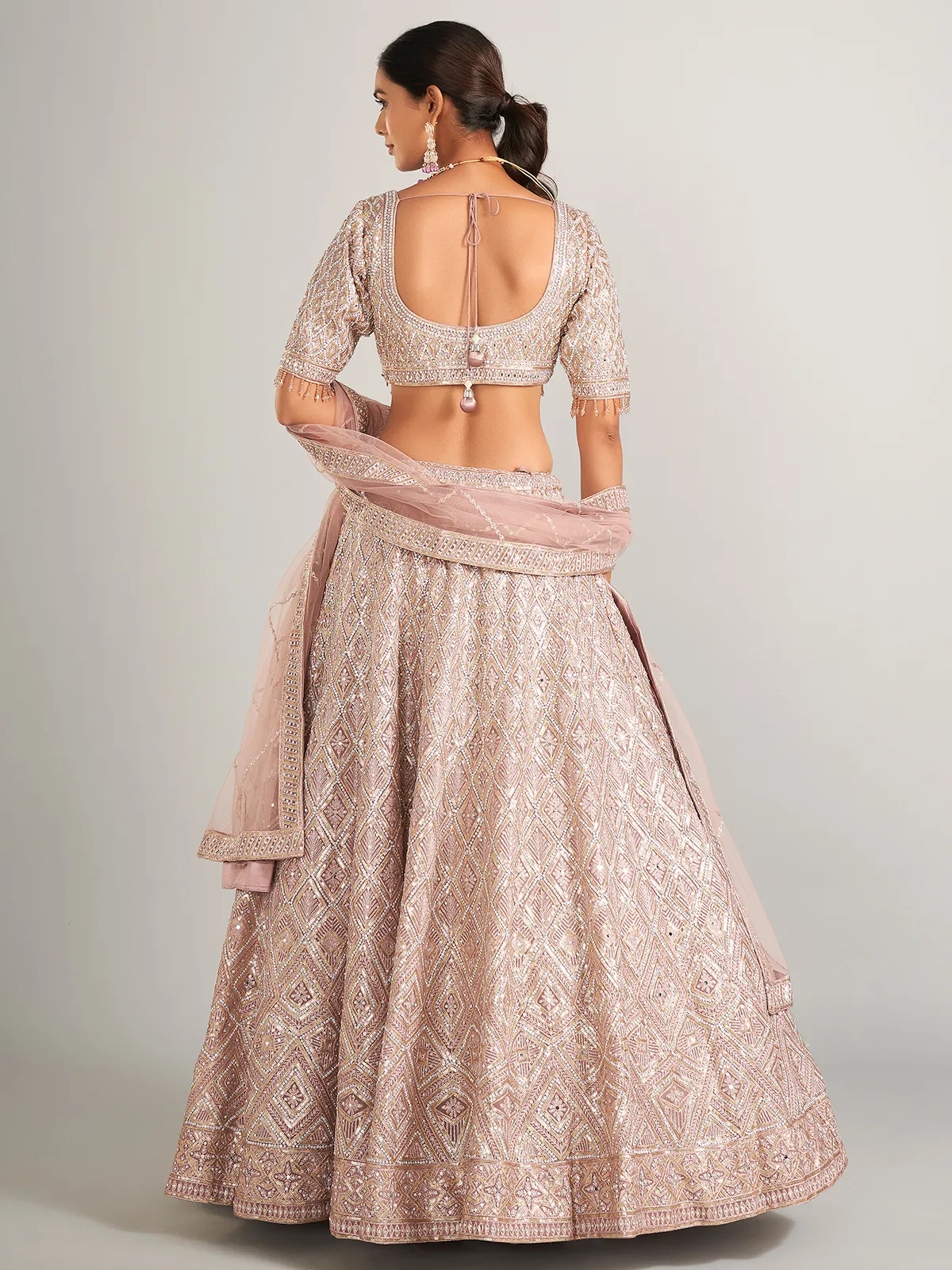 Beautiful onion hue lehenag choli in net