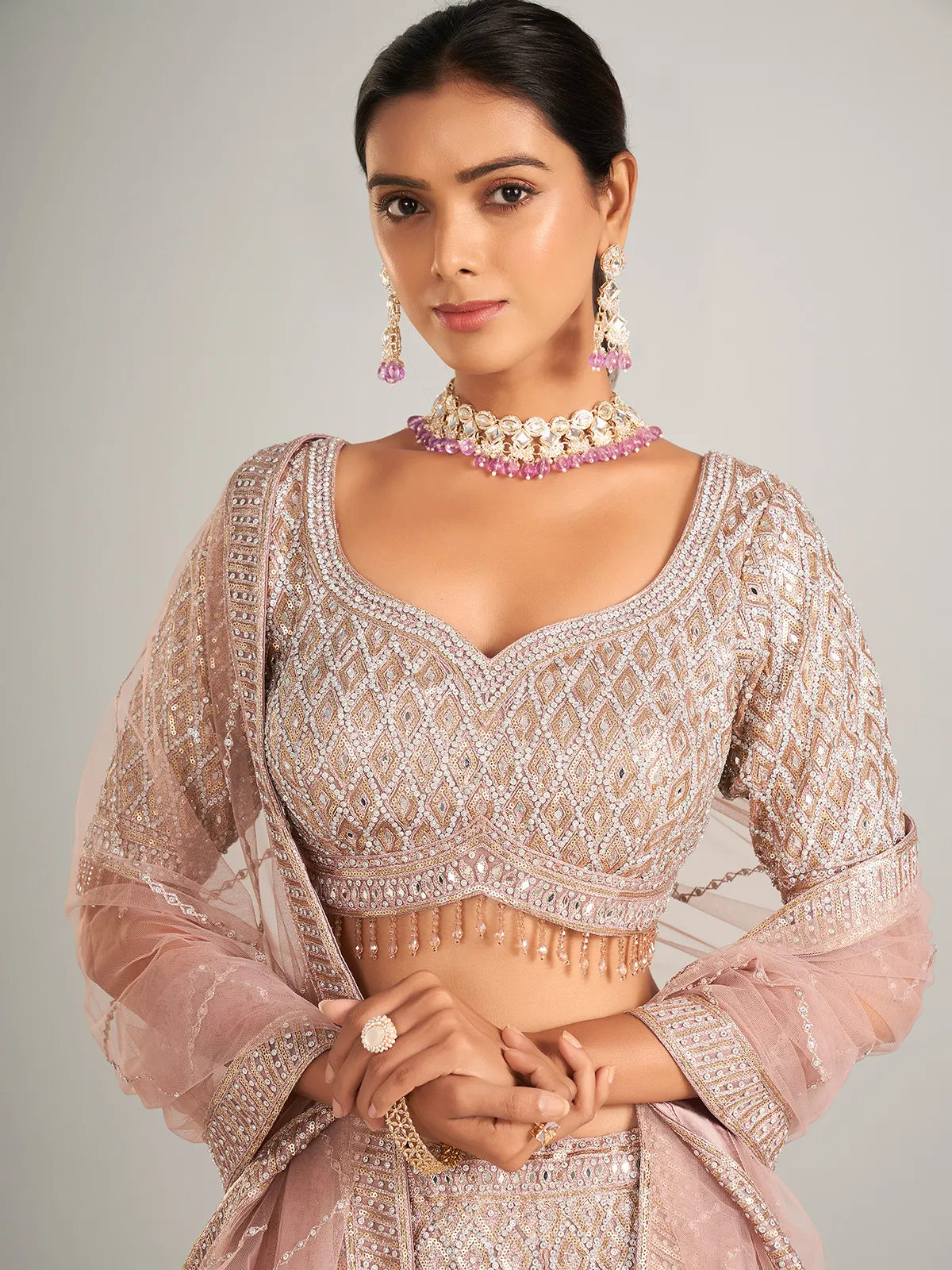 Beautiful onion hue lehenag choli in net
