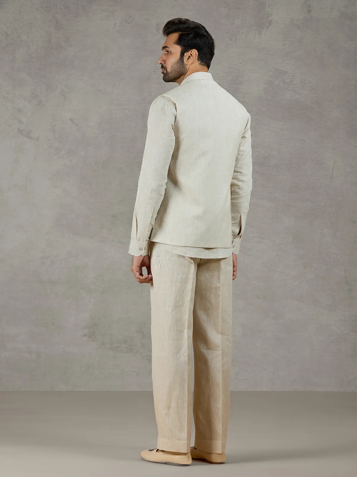 Beige linen festive wear waistcoat set with elegant detailing