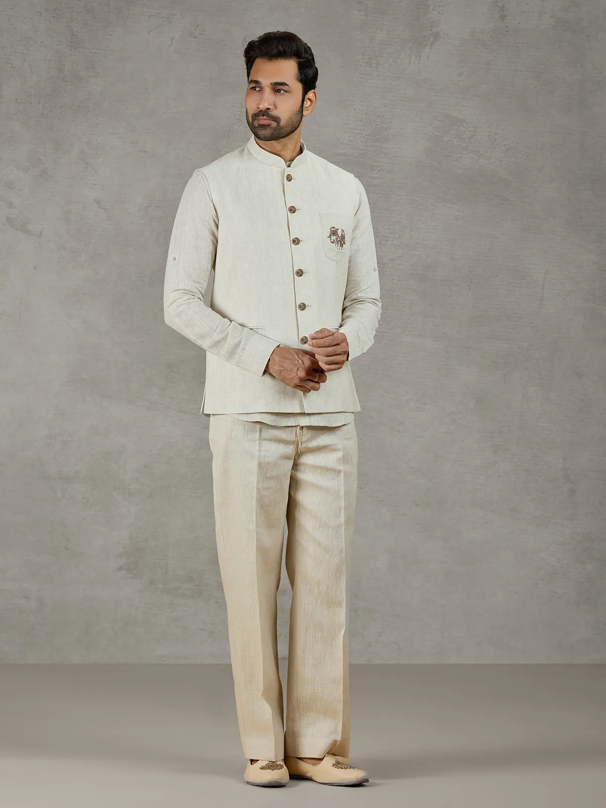 Beige linen festive wear waistcoat set with elegant detailing