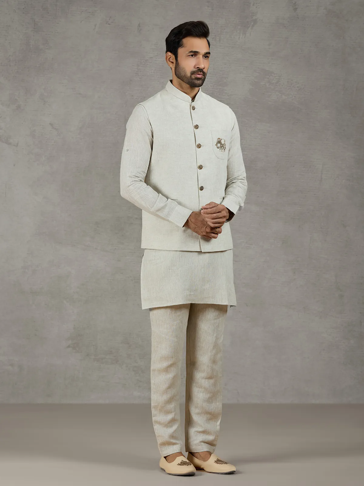 Beige linen waistcoat set with zari elephant embroidery