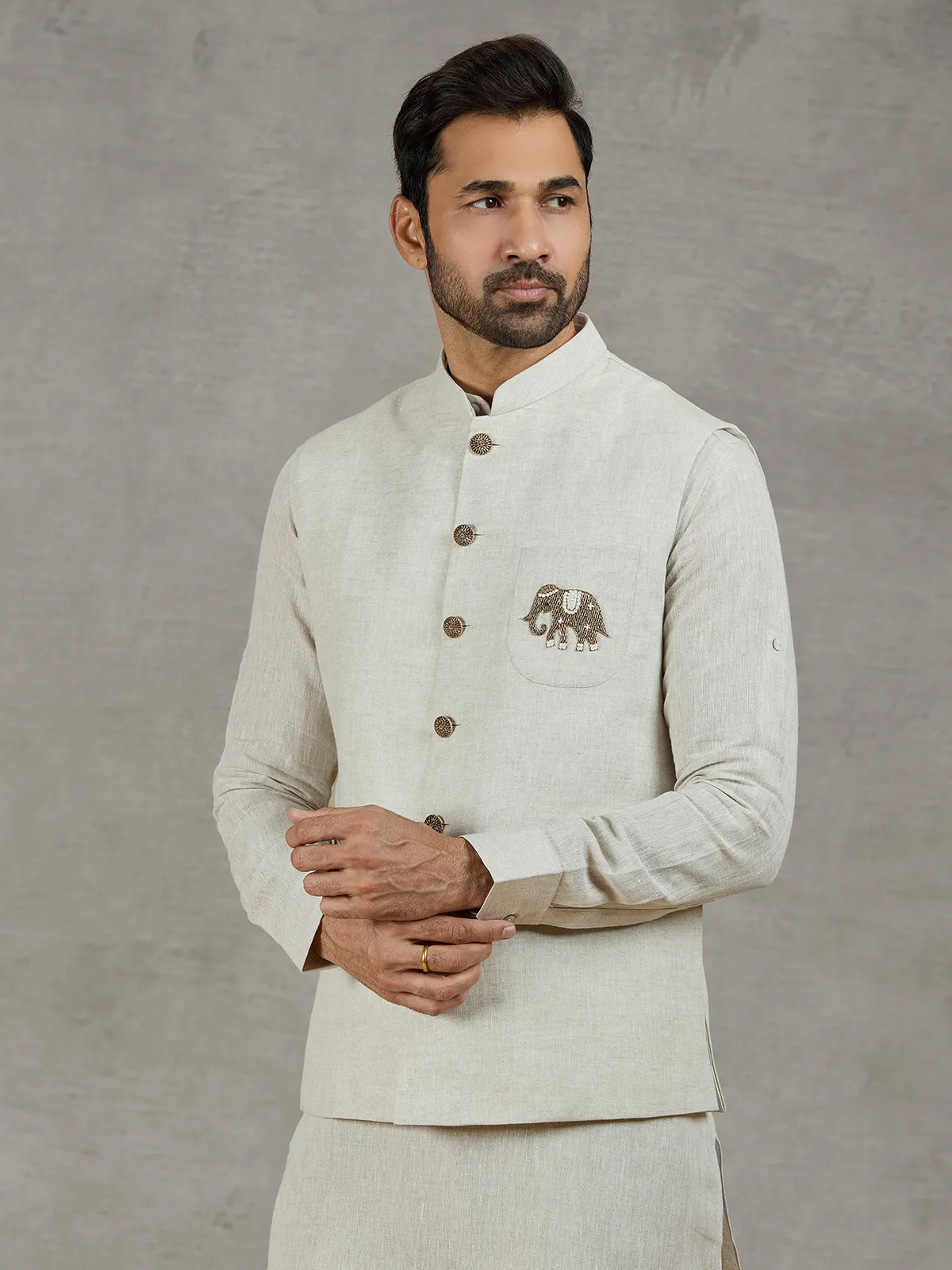Beige linen waistcoat set with zari elephant embroidery