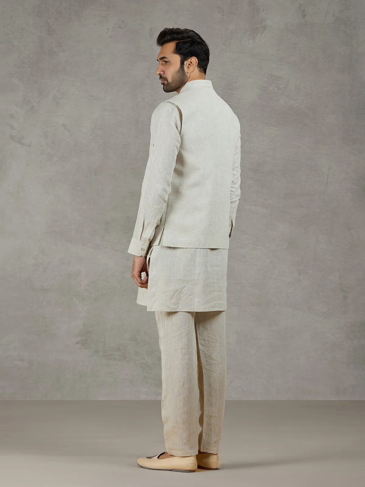 Beige linen waistcoat set with zari elephant embroidery