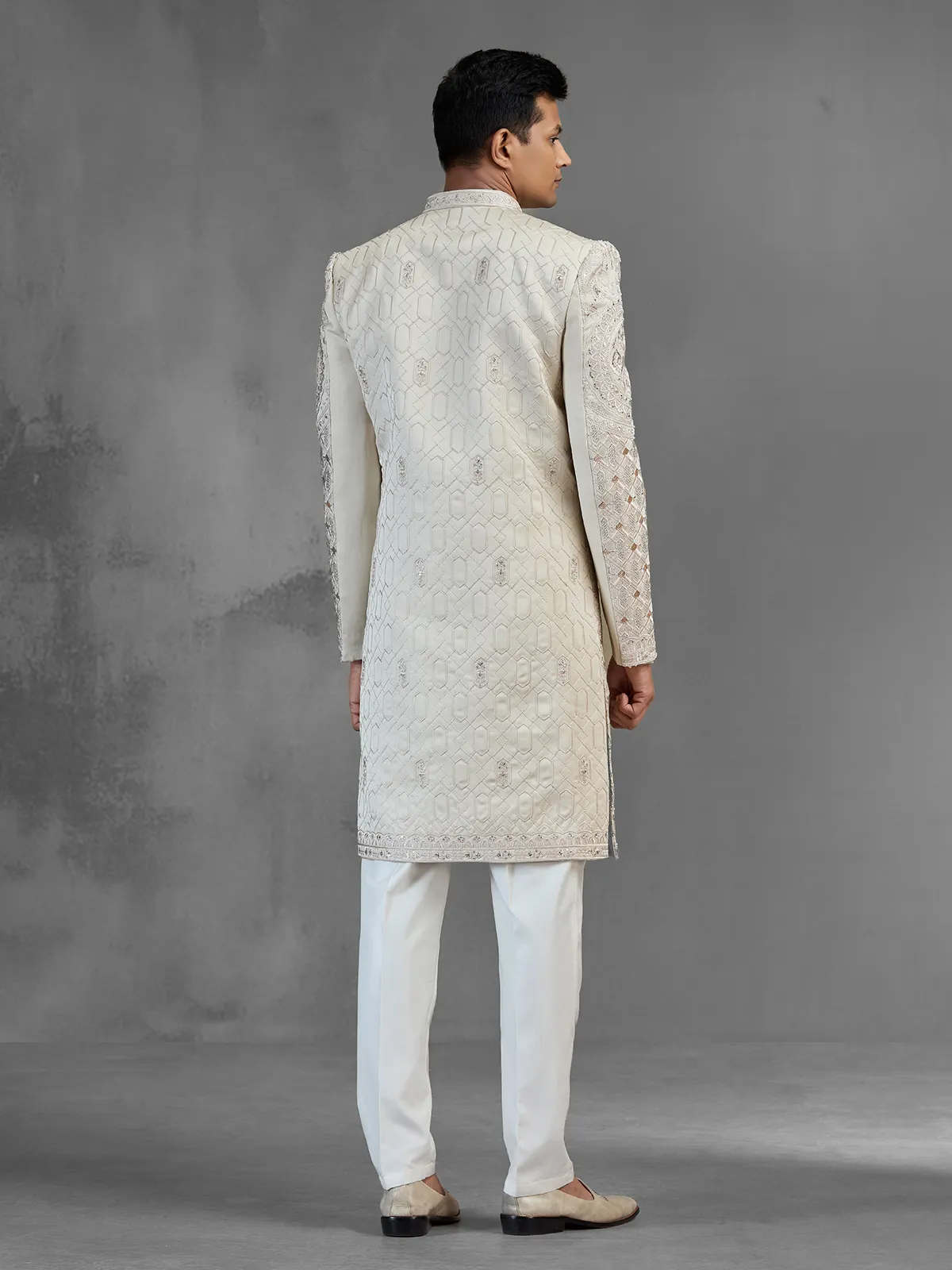 Beige silk open front sherwani with rich embroidery