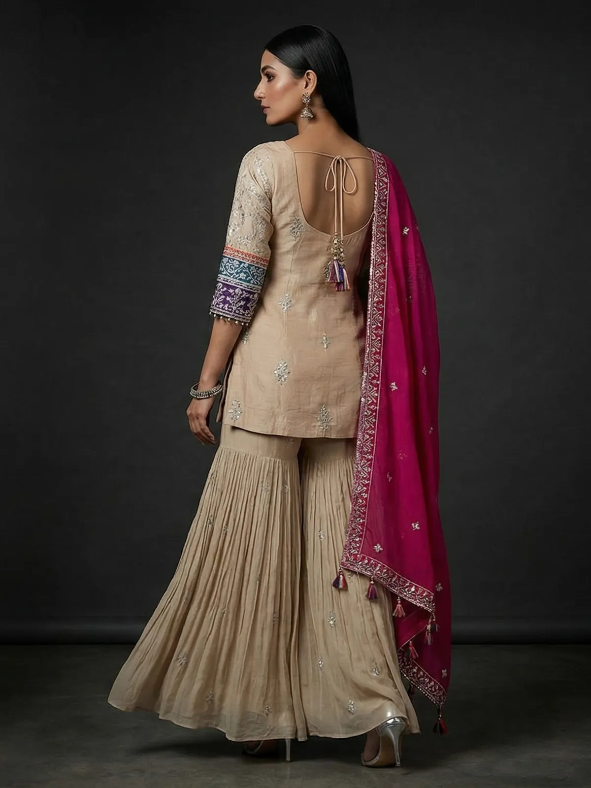 Beige silk sharara suit with elegant yoke design