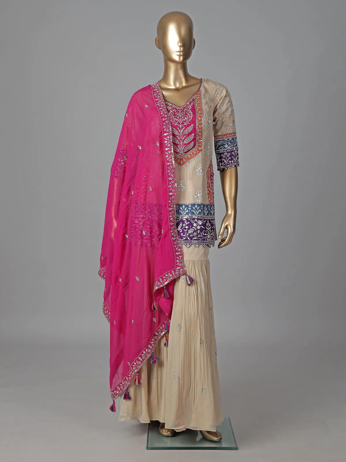 Beige silk sharara suit with elegant yoke design