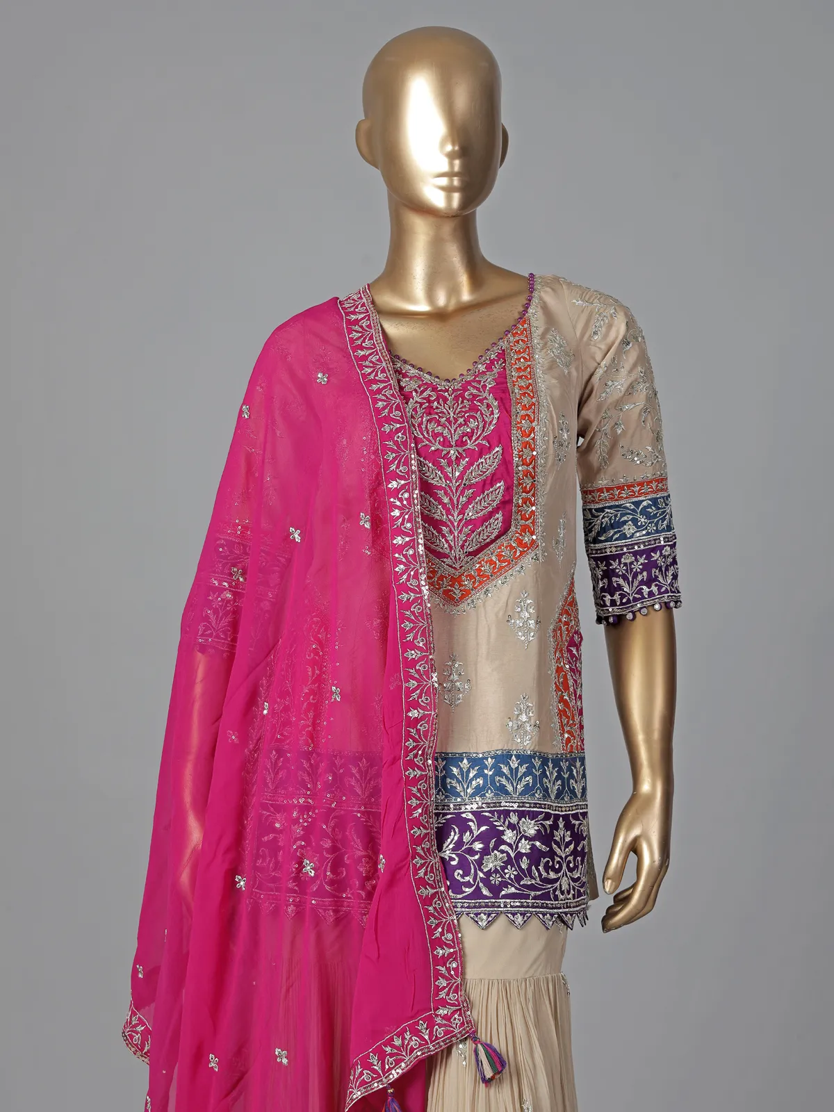 Beige silk sharara suit with elegant yoke design