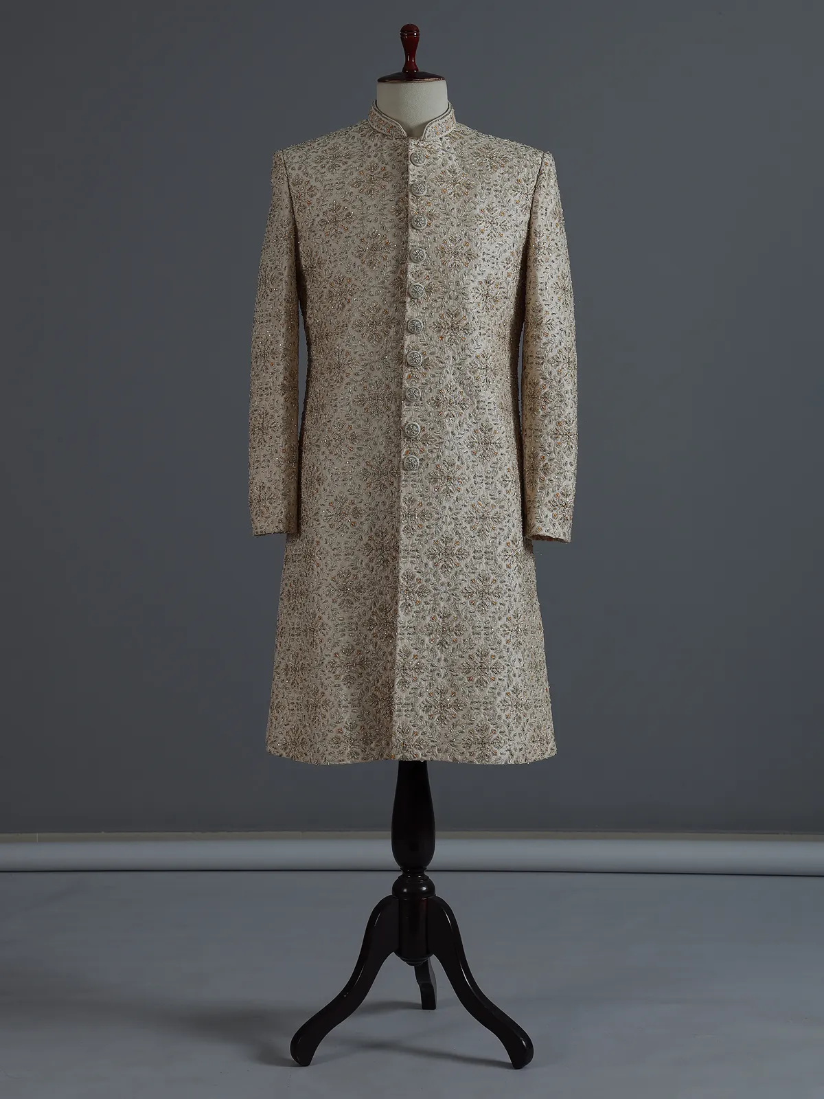 Beige silk sherwani with rich resham and zardosi accents