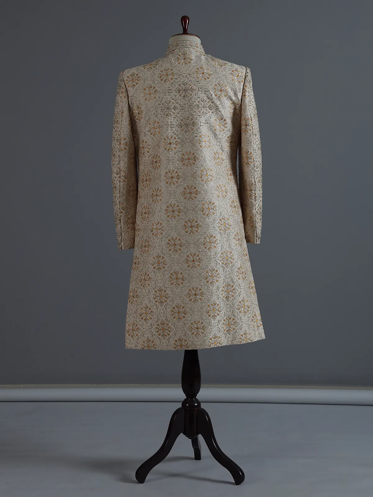 Beige silk sherwani with rich resham and zardosi accents