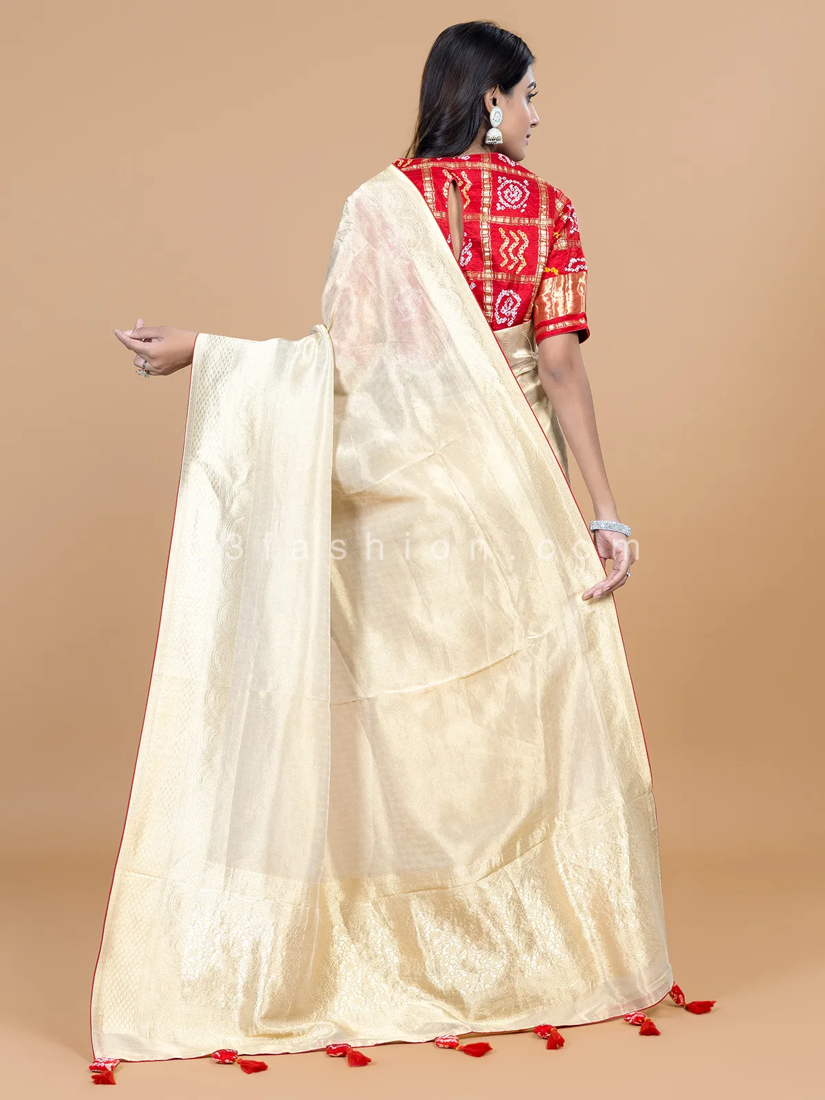 Cream wedding wear tissue silk saree