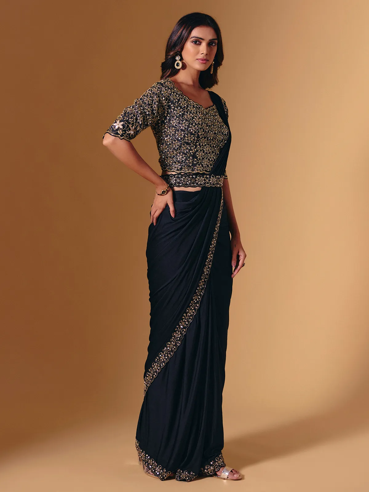 Black lycra saree with glossy cutdana and sequins work
