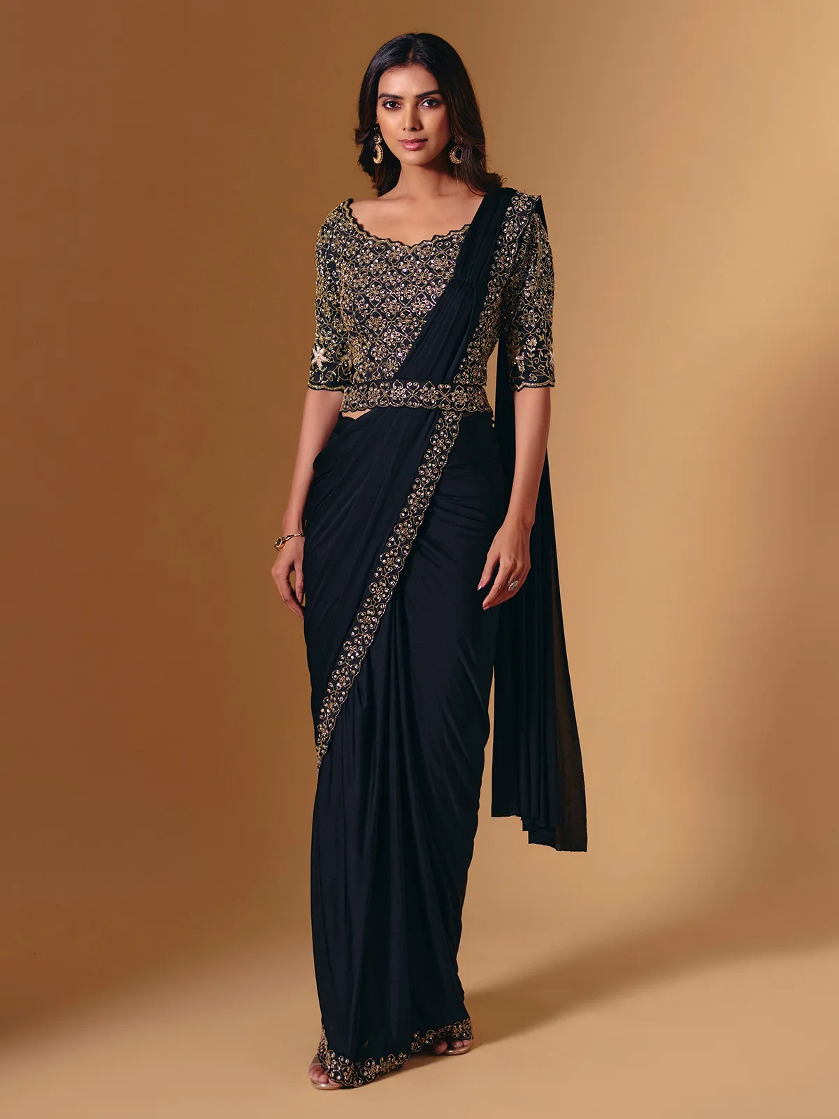 Black lycra saree with glossy cutdana and sequins work
