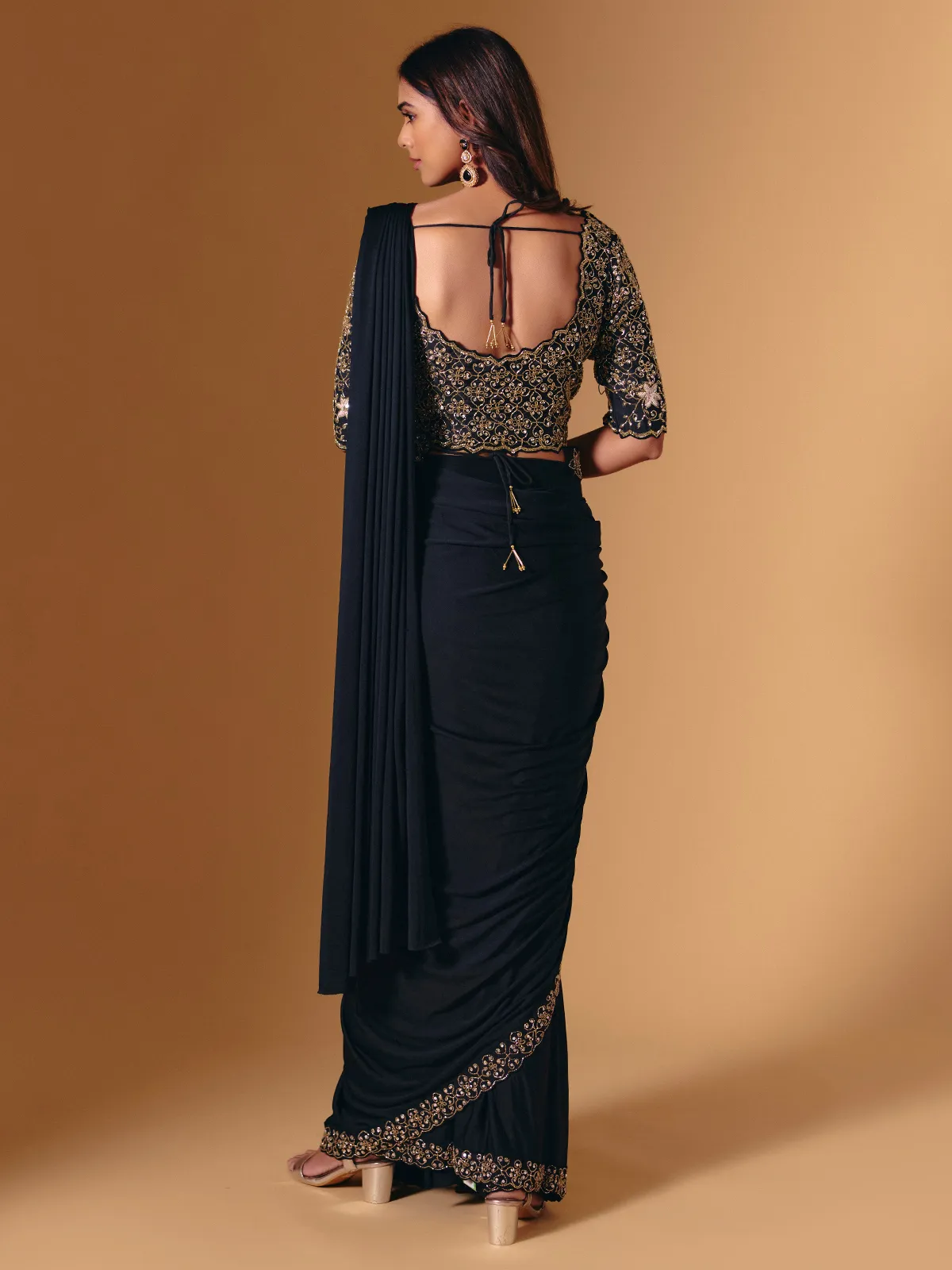 Black lycra saree with glossy cutdana and sequins work