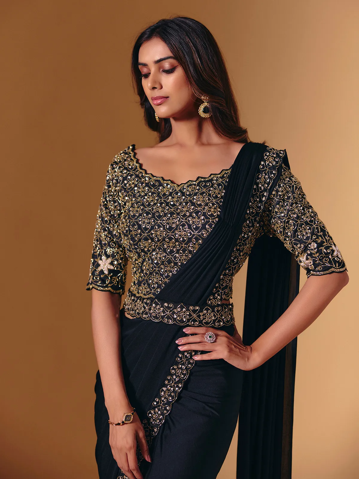 Black lycra saree with glossy cutdana and sequins work