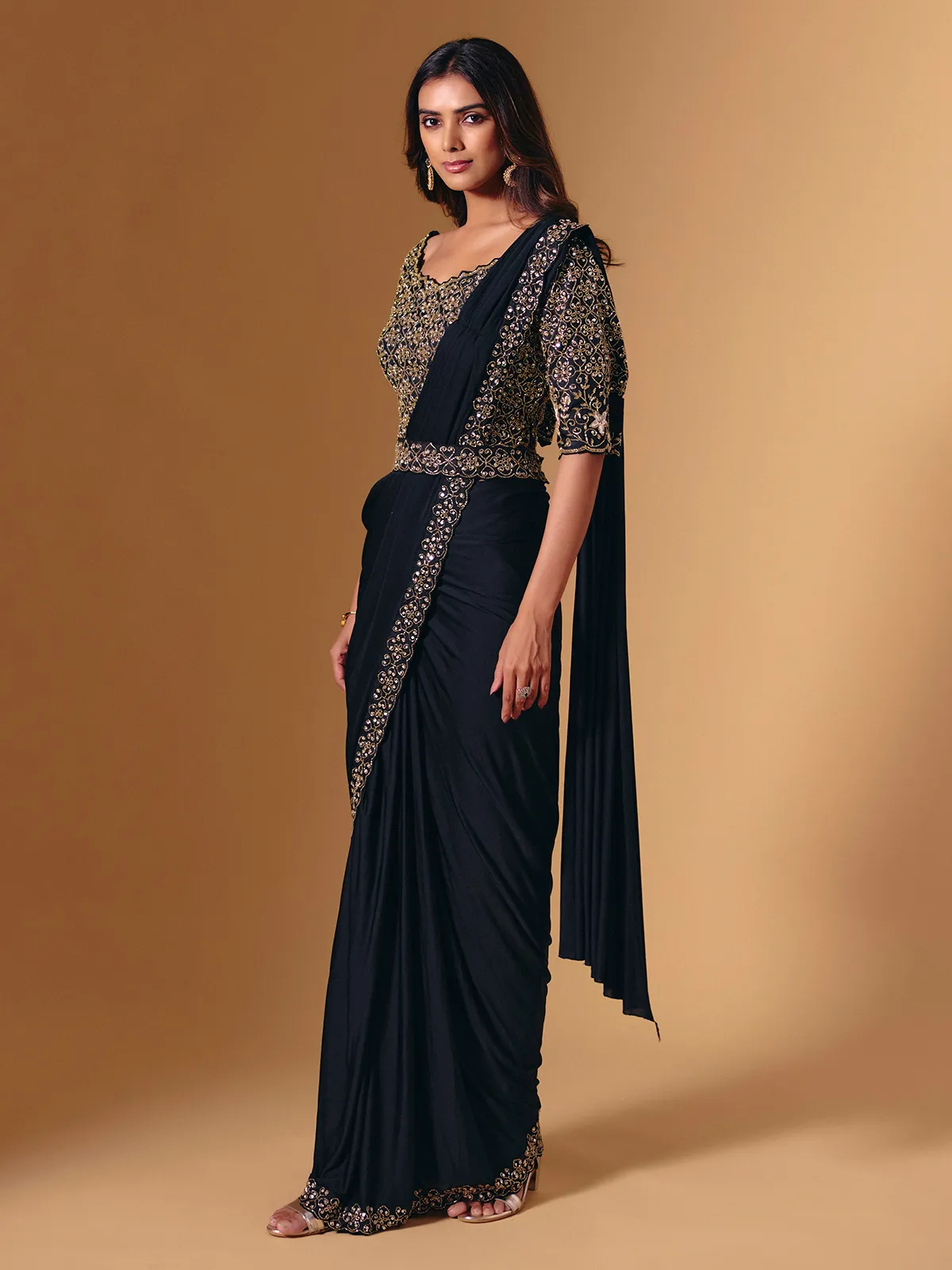 Black lycra saree with glossy cutdana and sequins work