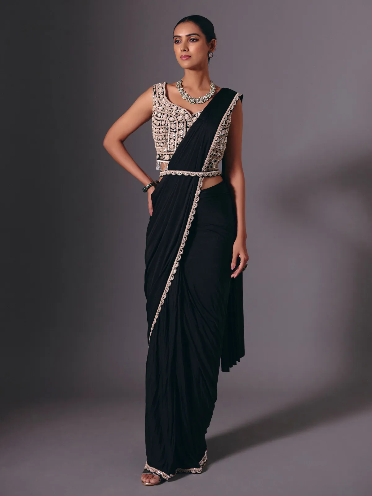 Black lycra saree with sequins and cutdana embellishments