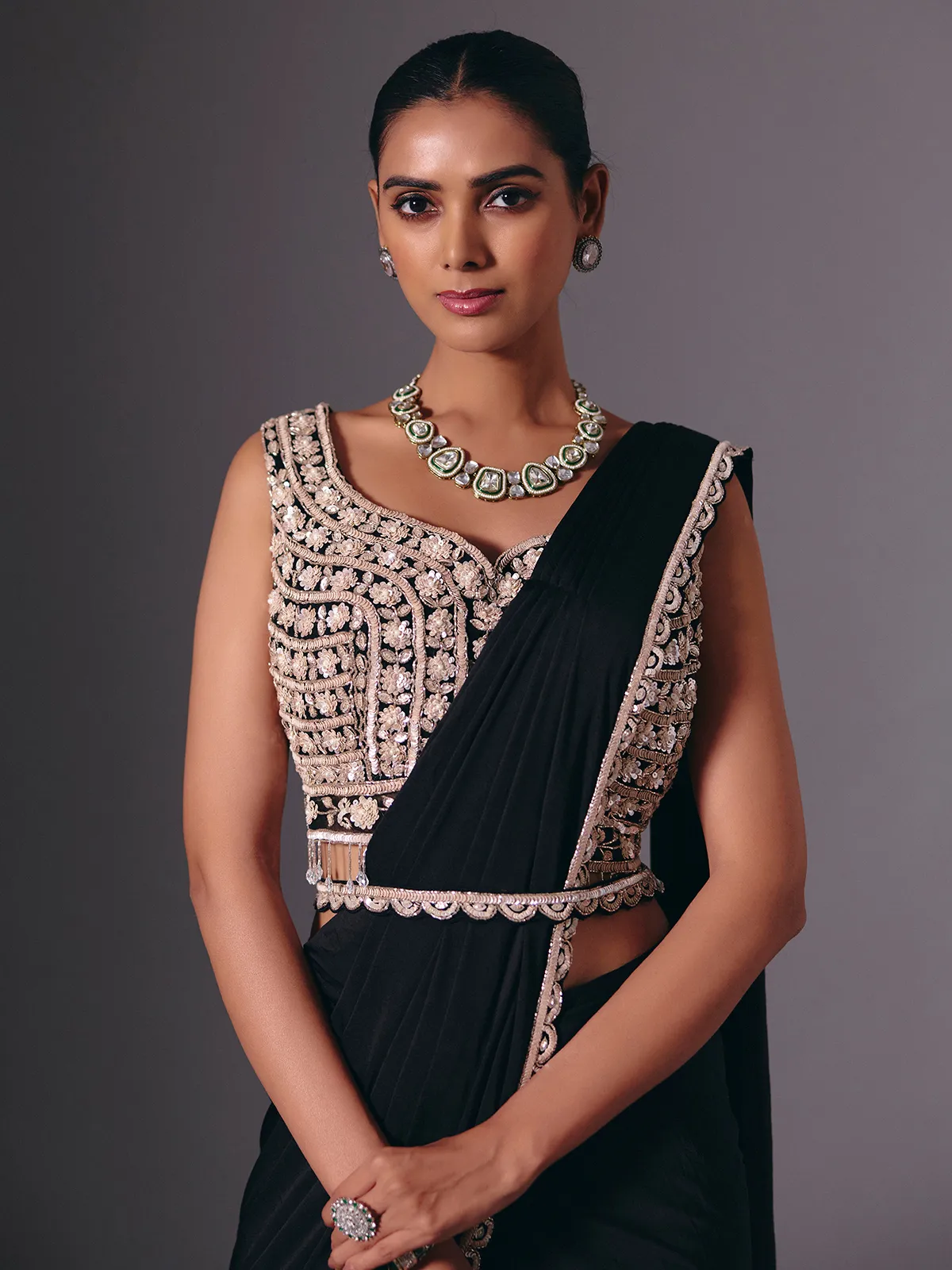 Black lycra saree with sequins and cutdana embellishments
