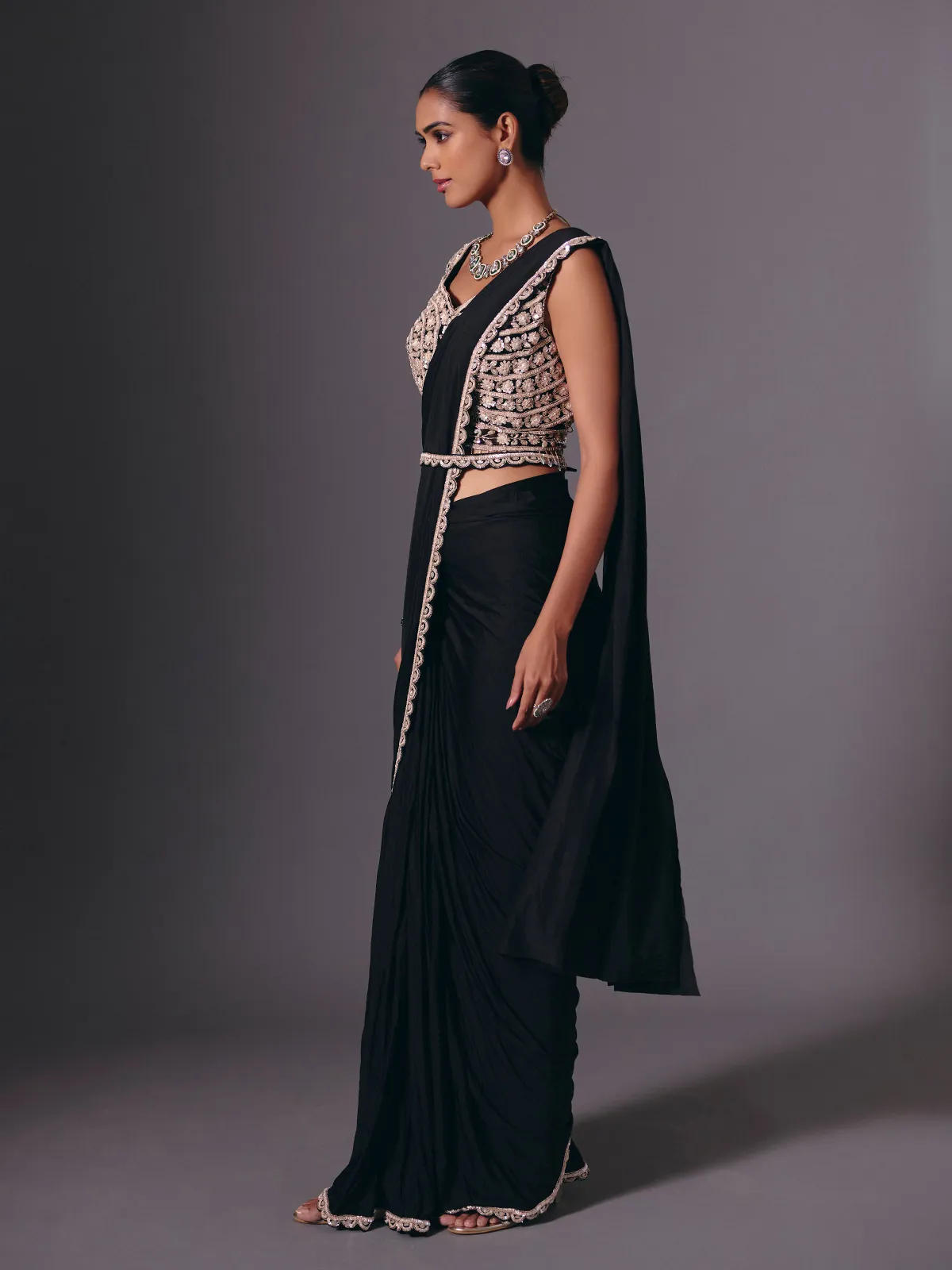 Black lycra saree with sequins and cutdana embellishments